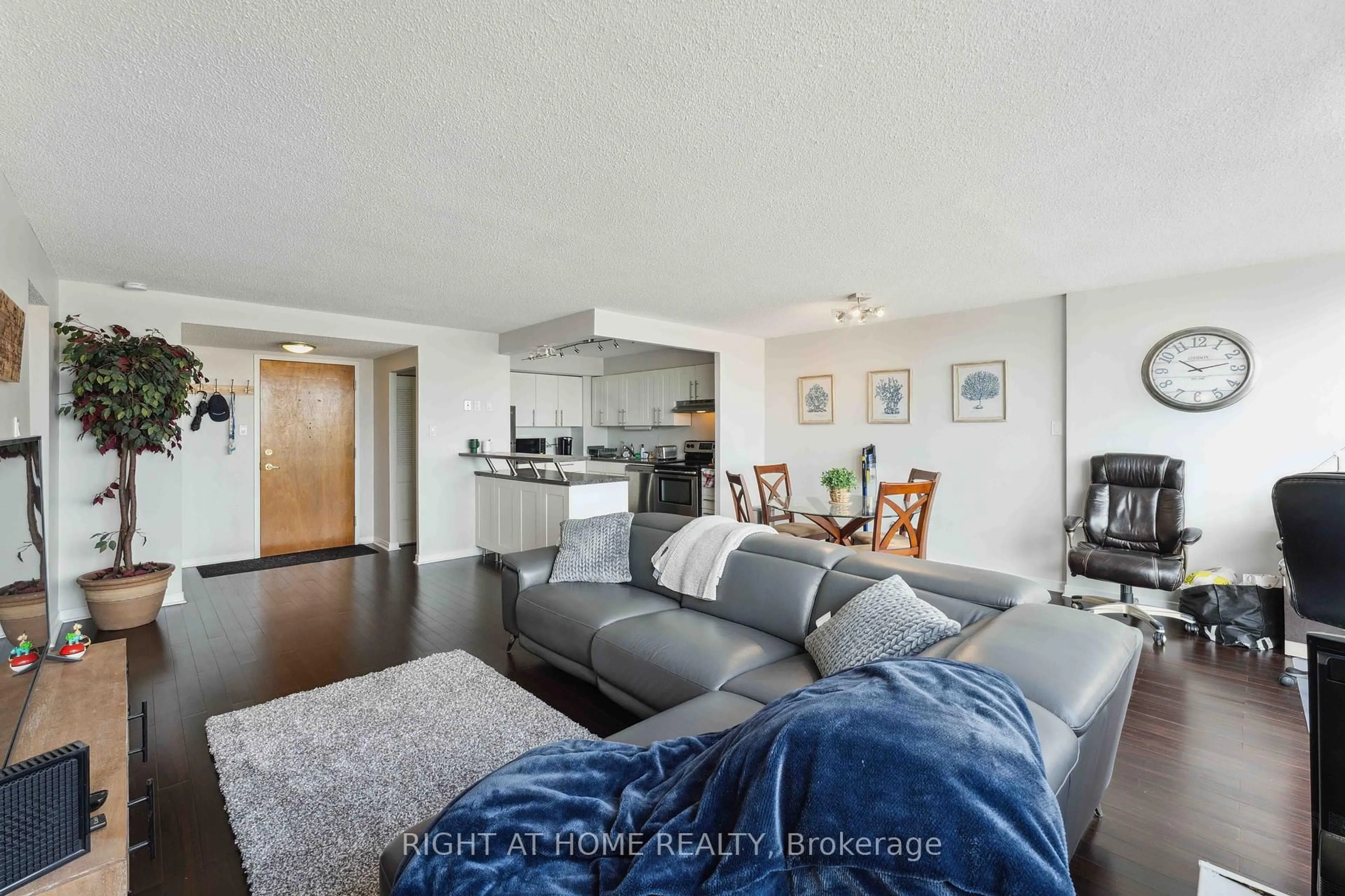Living room with furniture, wood/laminate floor for 2760 CAROUSEL Cres #502, Ottawa Ontario K1T 2N4