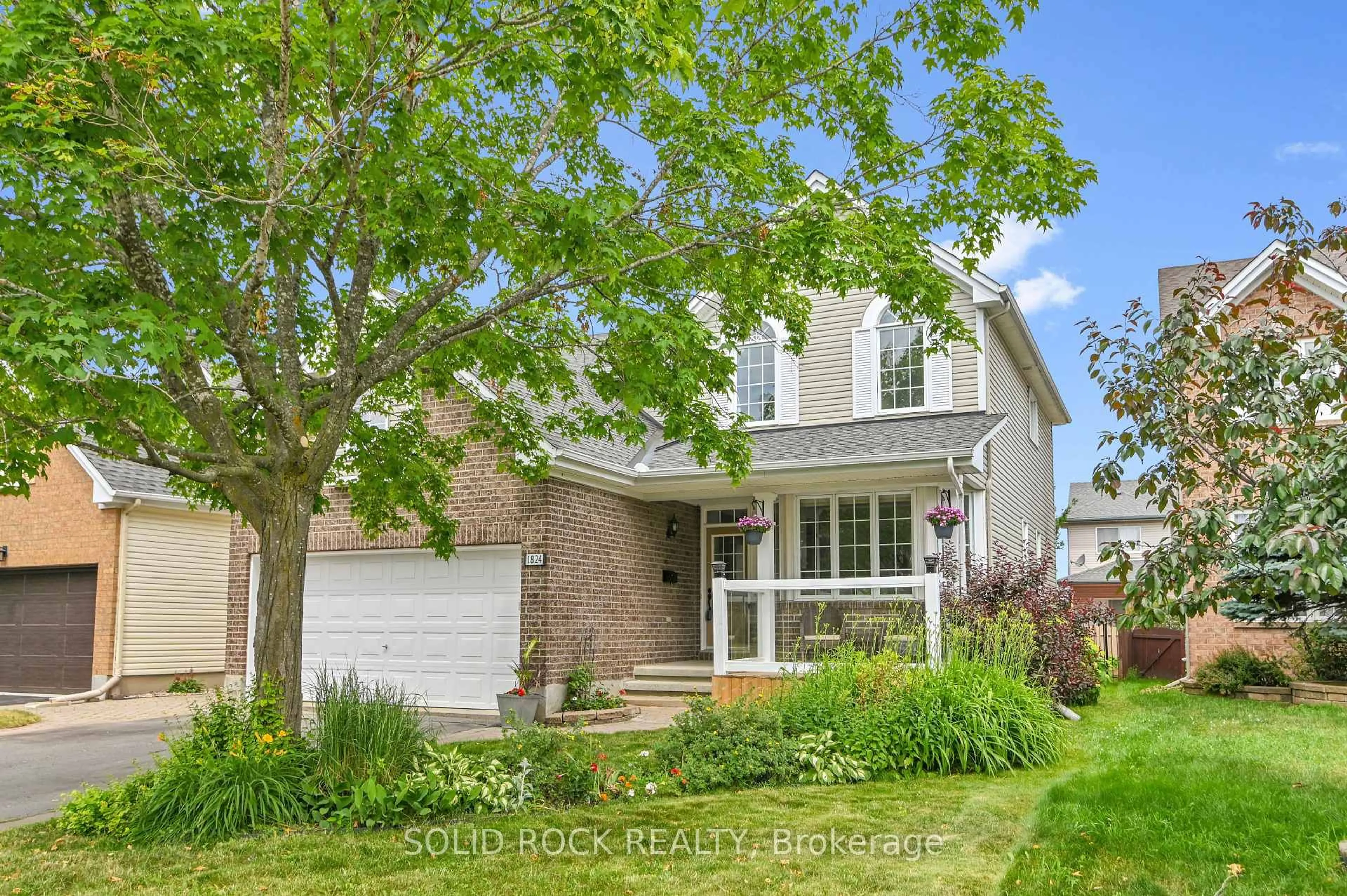 Home with brick exterior material, street for 1824 McCallum Dr, Ottawa Ontario K4A 3T7
