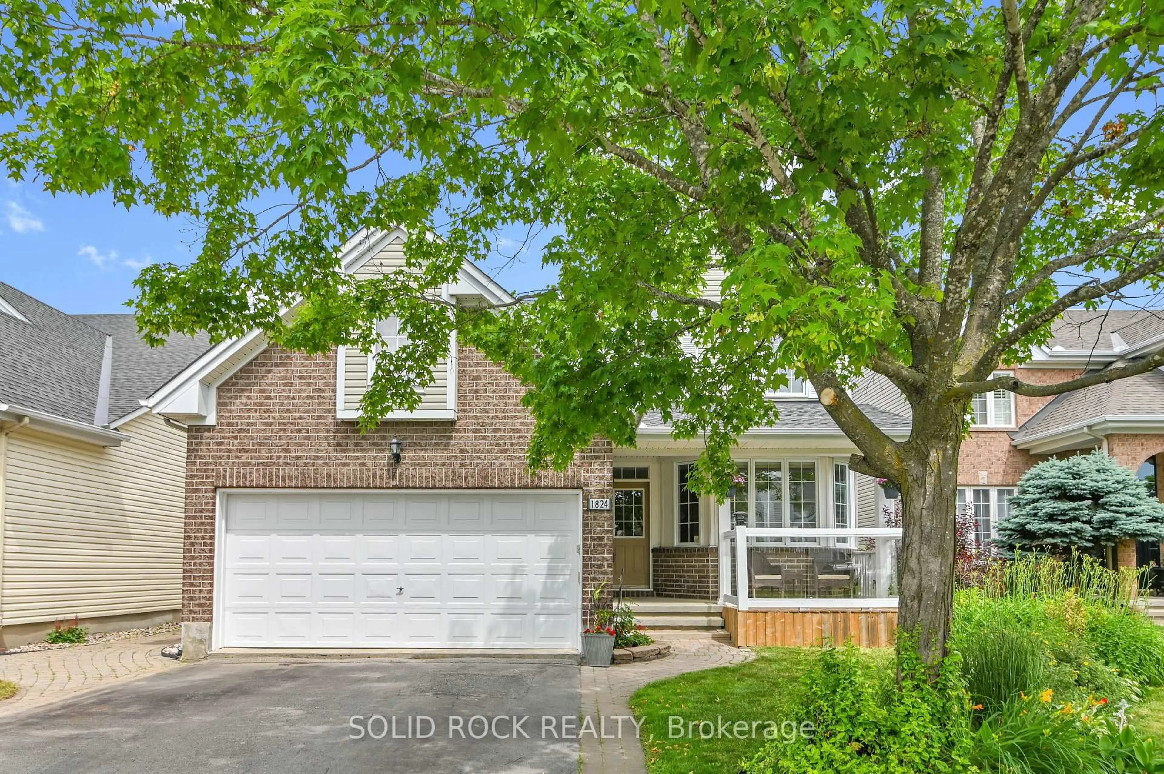 Home with brick exterior material, street for 1824 McCallum Dr, Ottawa Ontario K4A 3T7