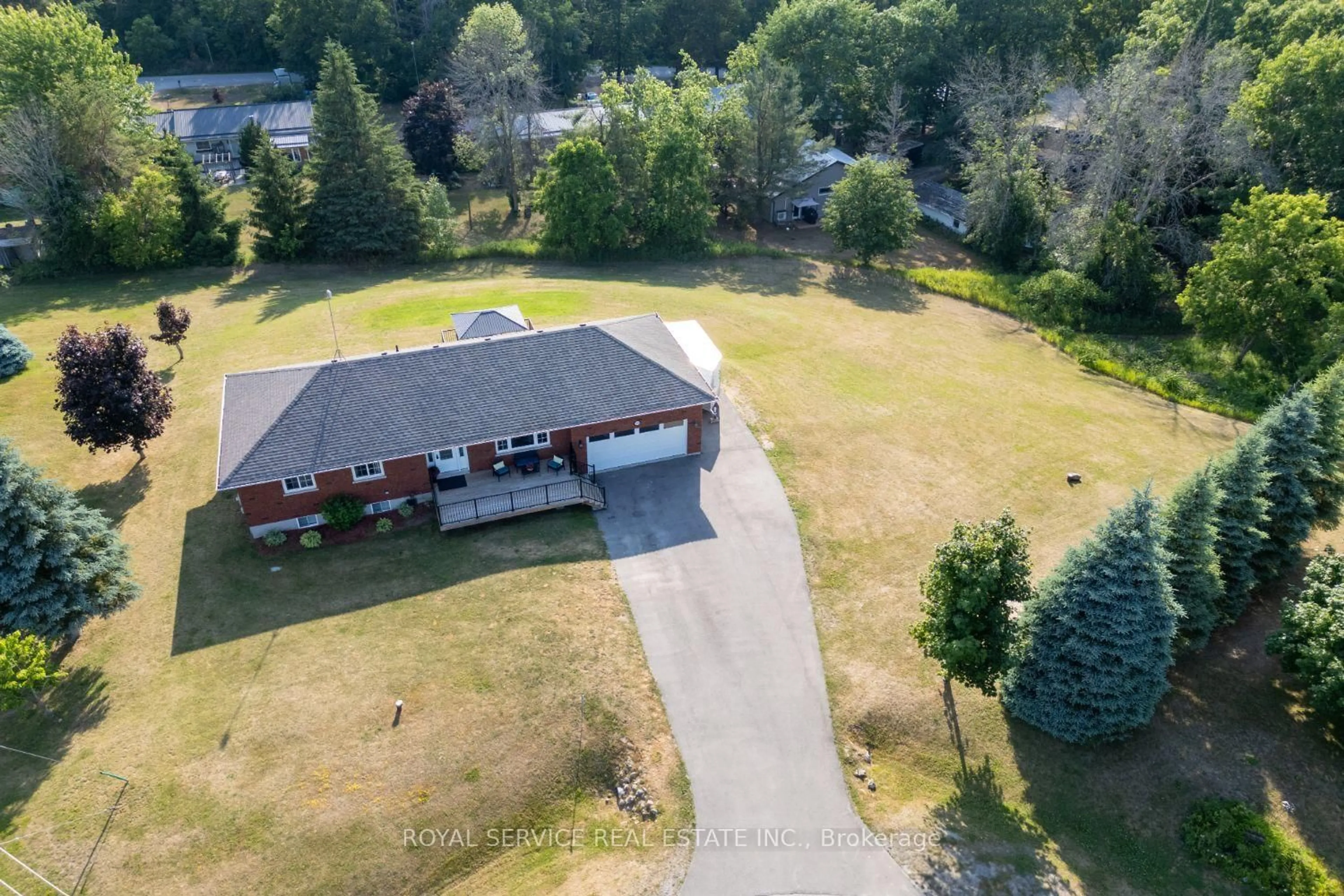 A pic from outside/outdoor area/front of a property/back of a property/a pic from drone, unknown for 922 Bensfort Hts, Otonabee-South Monaghan Ontario K0L 1B0