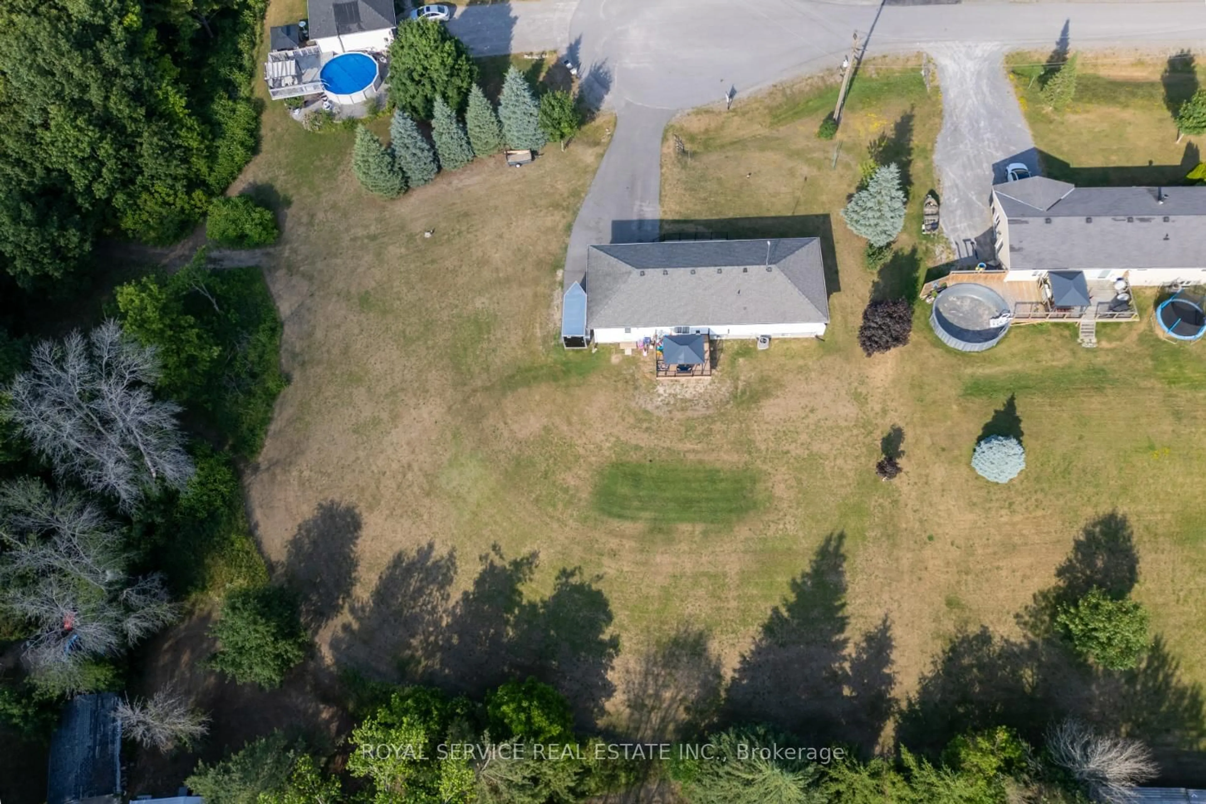 A pic from outside/outdoor area/front of a property/back of a property/a pic from drone, unknown for 922 Bensfort Hts, Otonabee-South Monaghan Ontario K0L 1B0