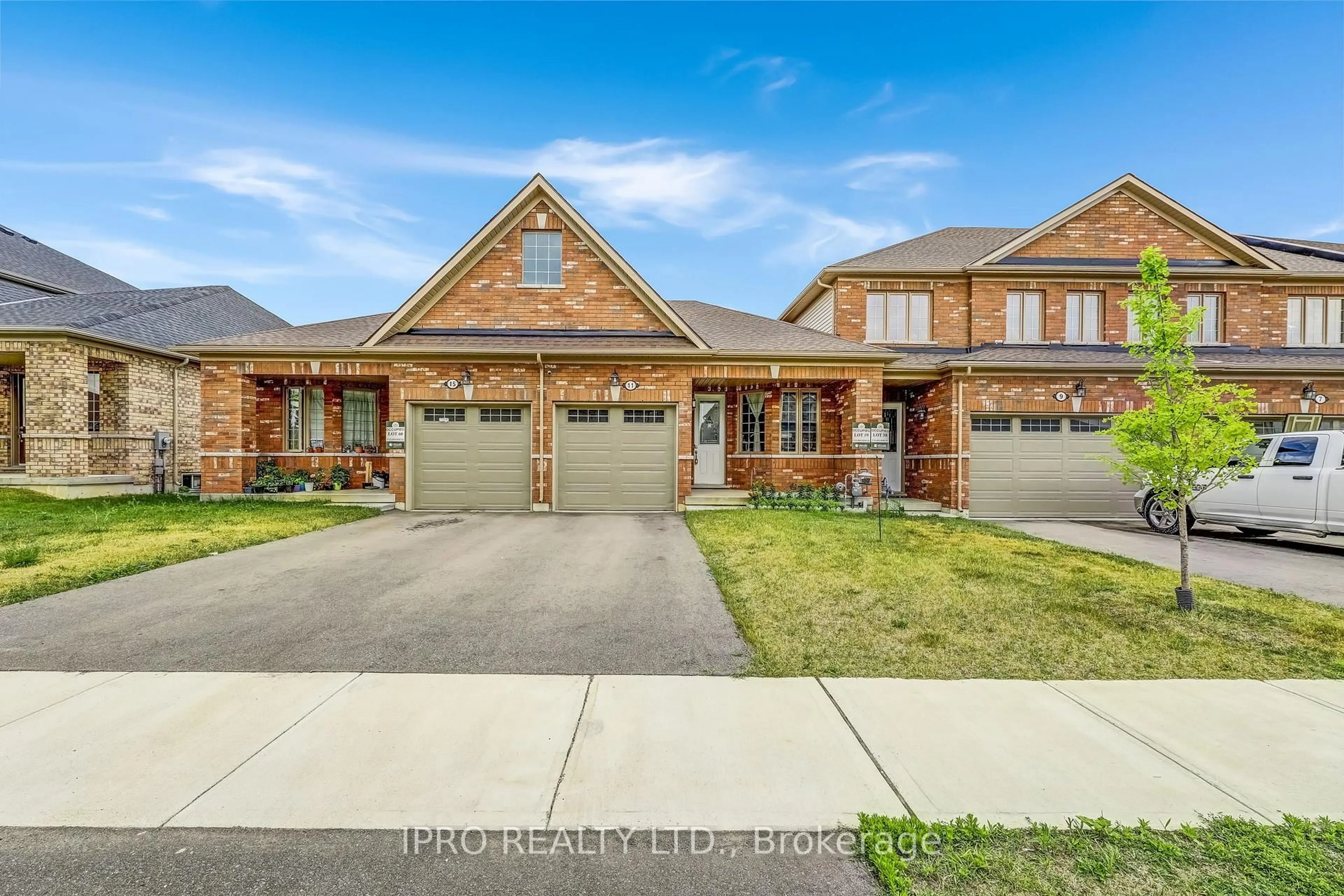 Home with brick exterior material, street for 11 Harwood St, Tillsonburg Ontario N4G 0J7