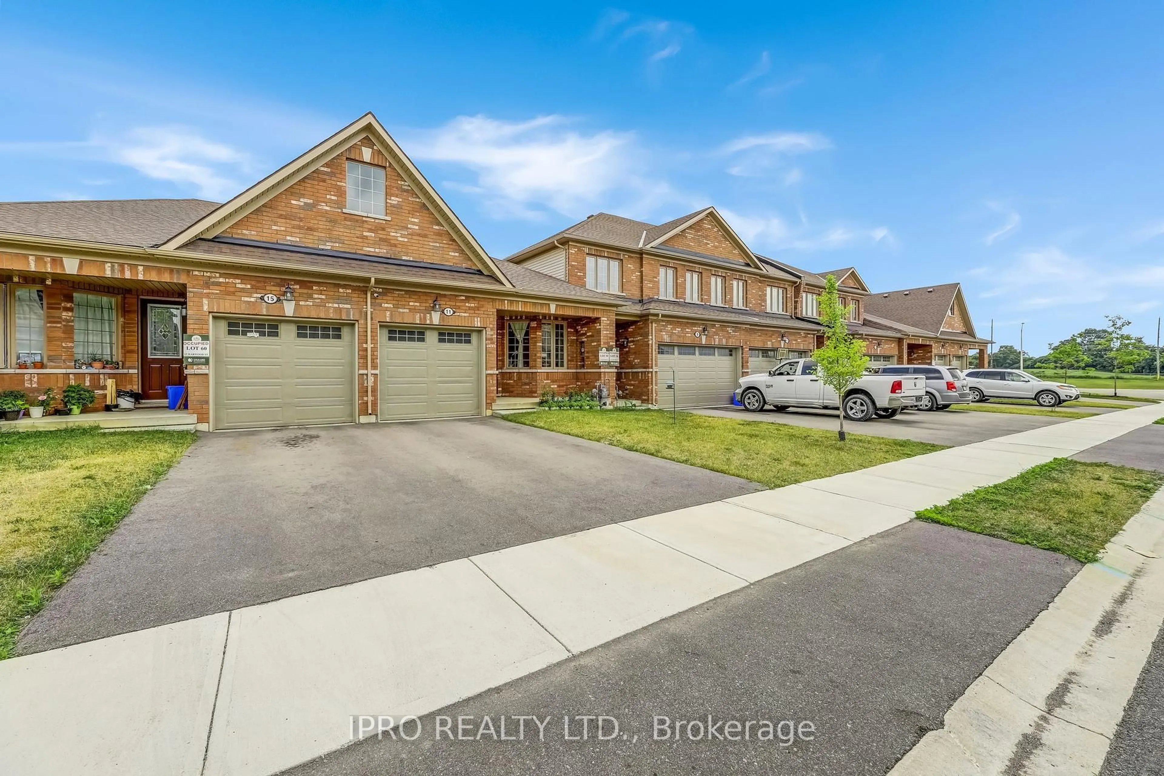Home with brick exterior material, street for 11 Harwood St, Tillsonburg Ontario N4G 0J7