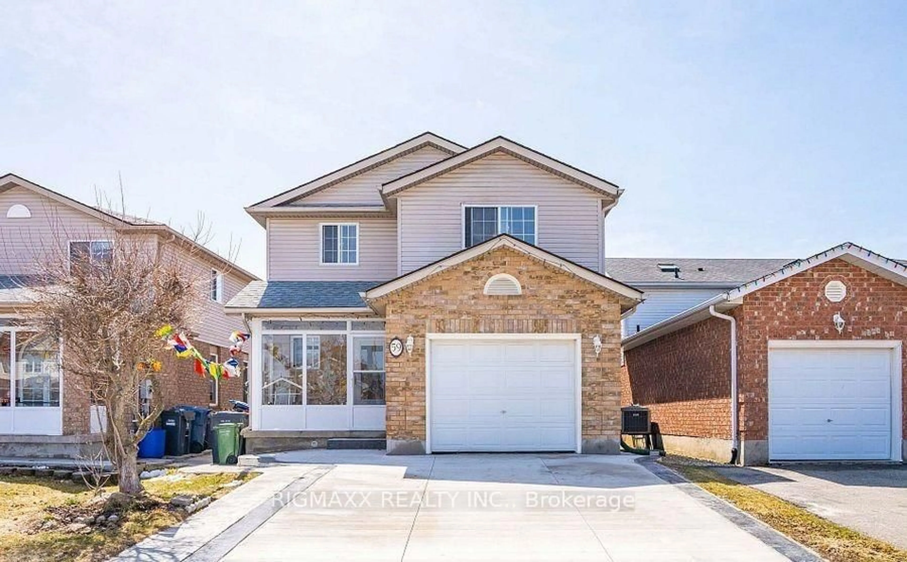 Home with brick exterior material, street for 59 Deerpath Dr, Guelph Ontario N1K 1V1