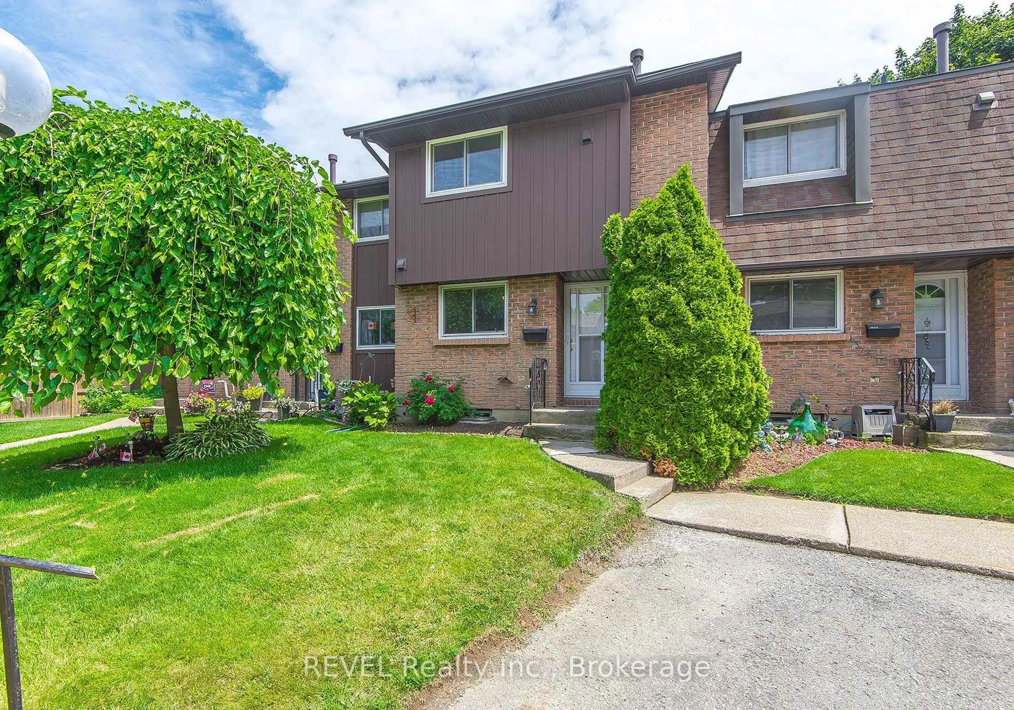 A pic from outside/outdoor area/front of a property/back of a property/a pic from drone, street for 151 Linwell Rd #54, St. Catharines Ontario L2N 6P3