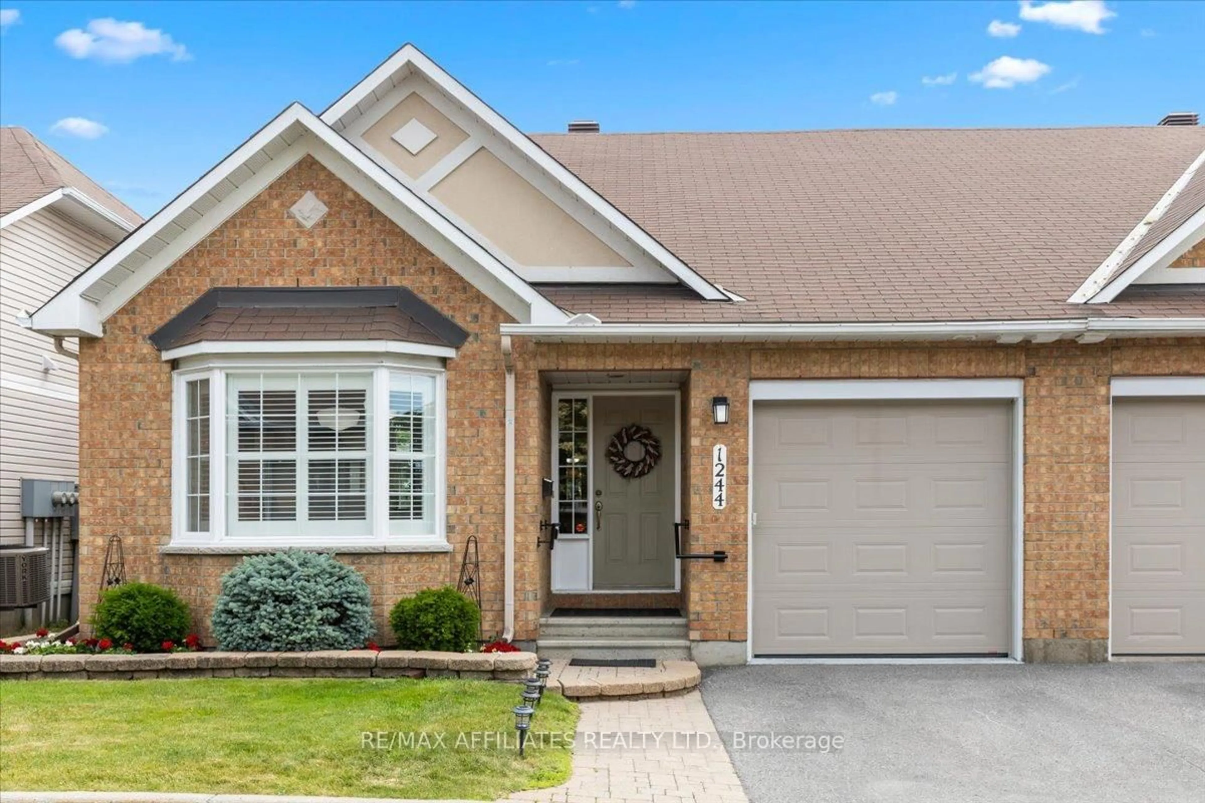 Home with brick exterior material, street for 1244 Foxborough Private #-, Ottawa Ontario K1J 1E2