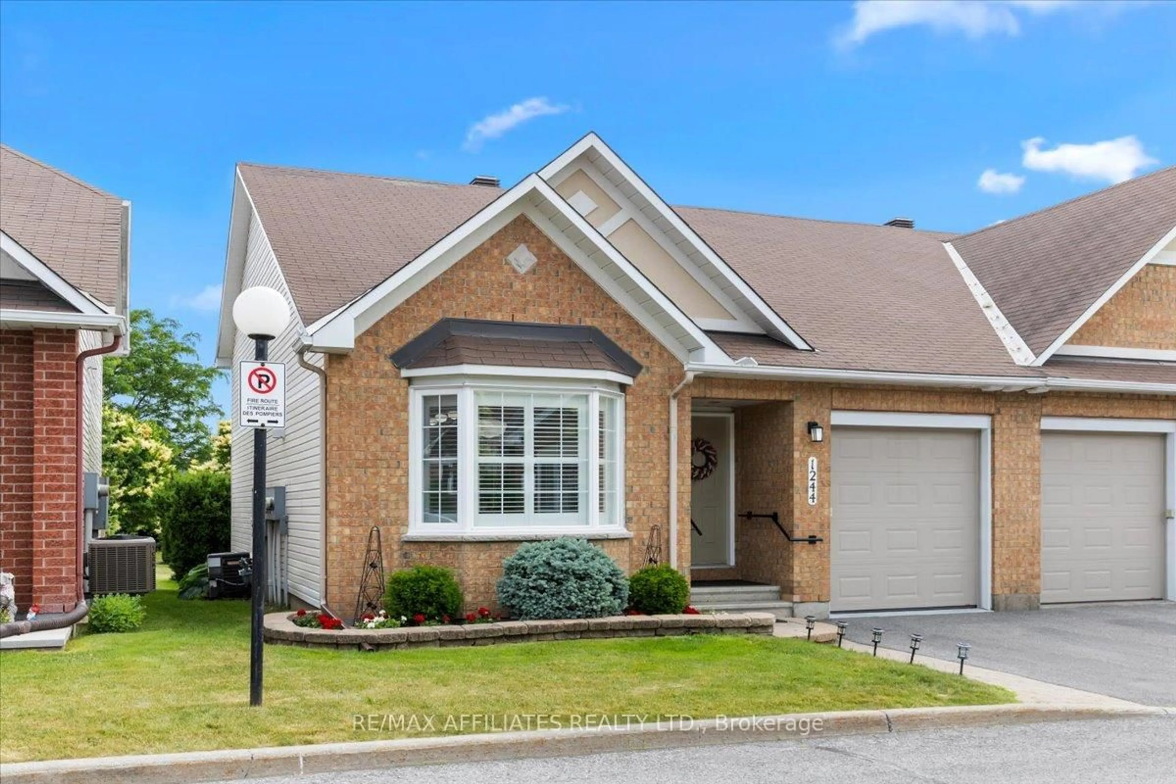 Home with brick exterior material, street for 1244 Foxborough Private #-, Ottawa Ontario K1J 1E2