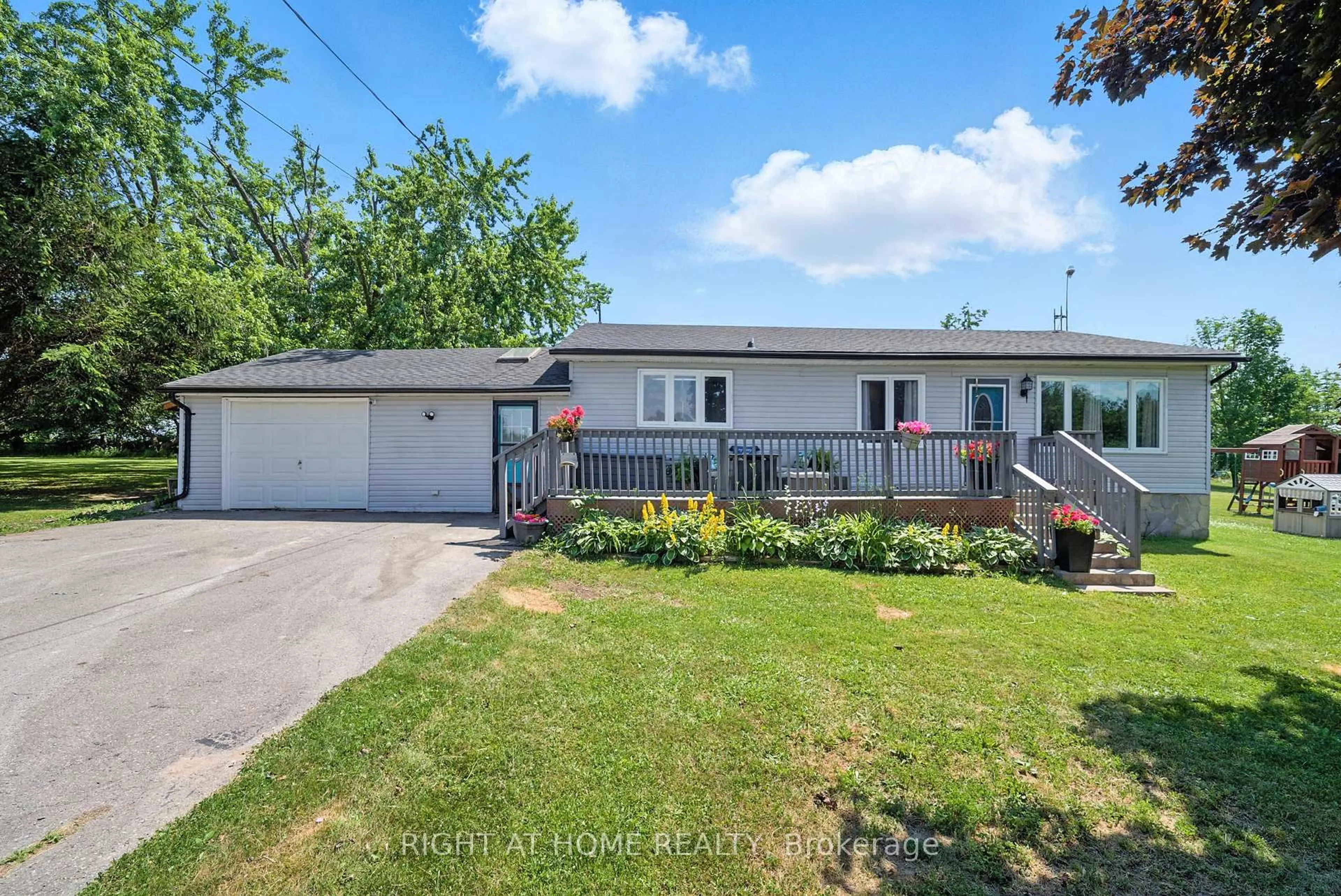 A pic from outside/outdoor area/front of a property/back of a property/a pic from drone, street for 831 Kimberly Dr, Selwyn Ontario K0L 1T0