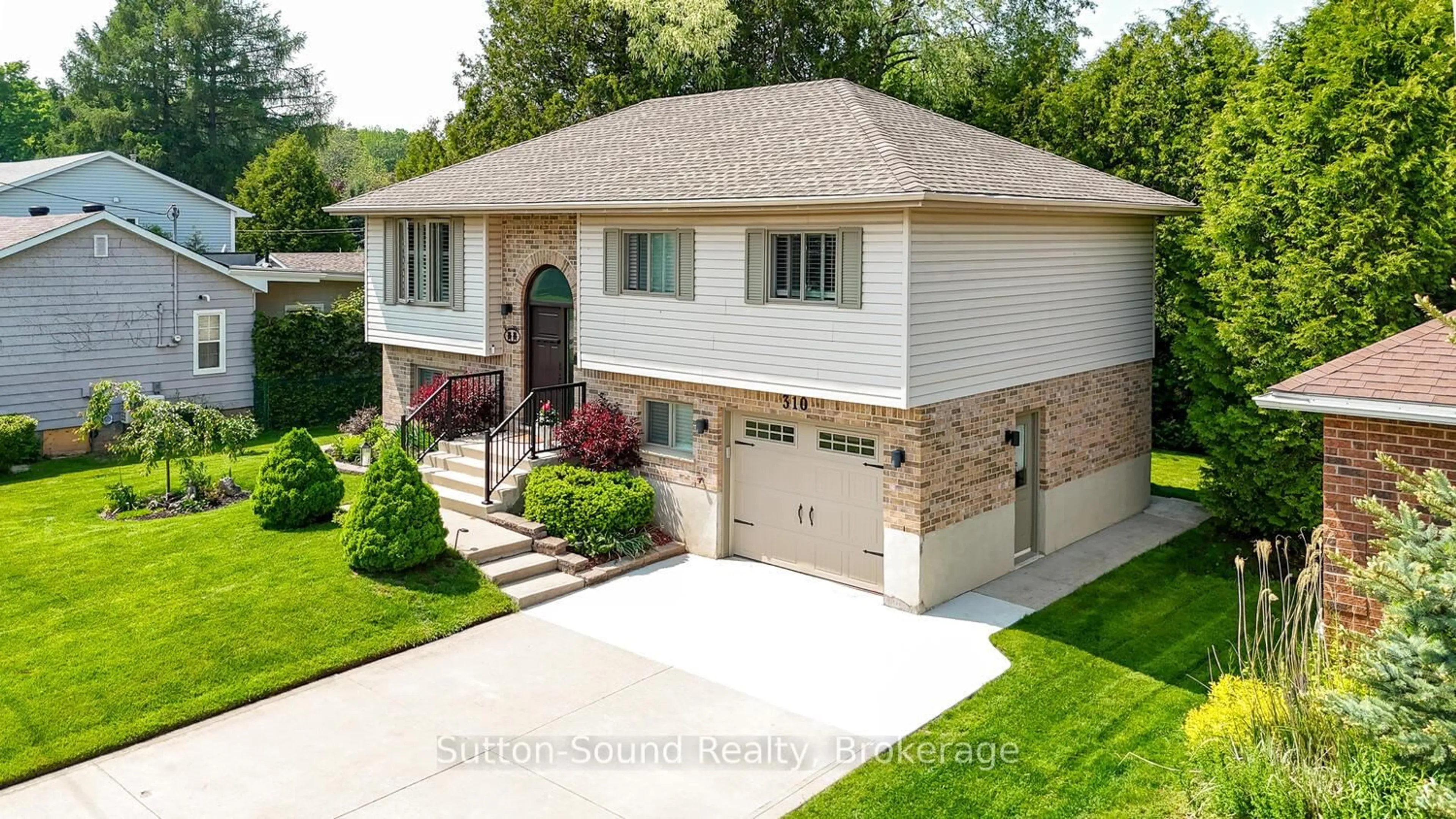 Home with brick exterior material, street for 310 Beattie St, Owen Sound Ontario N4K 6X2