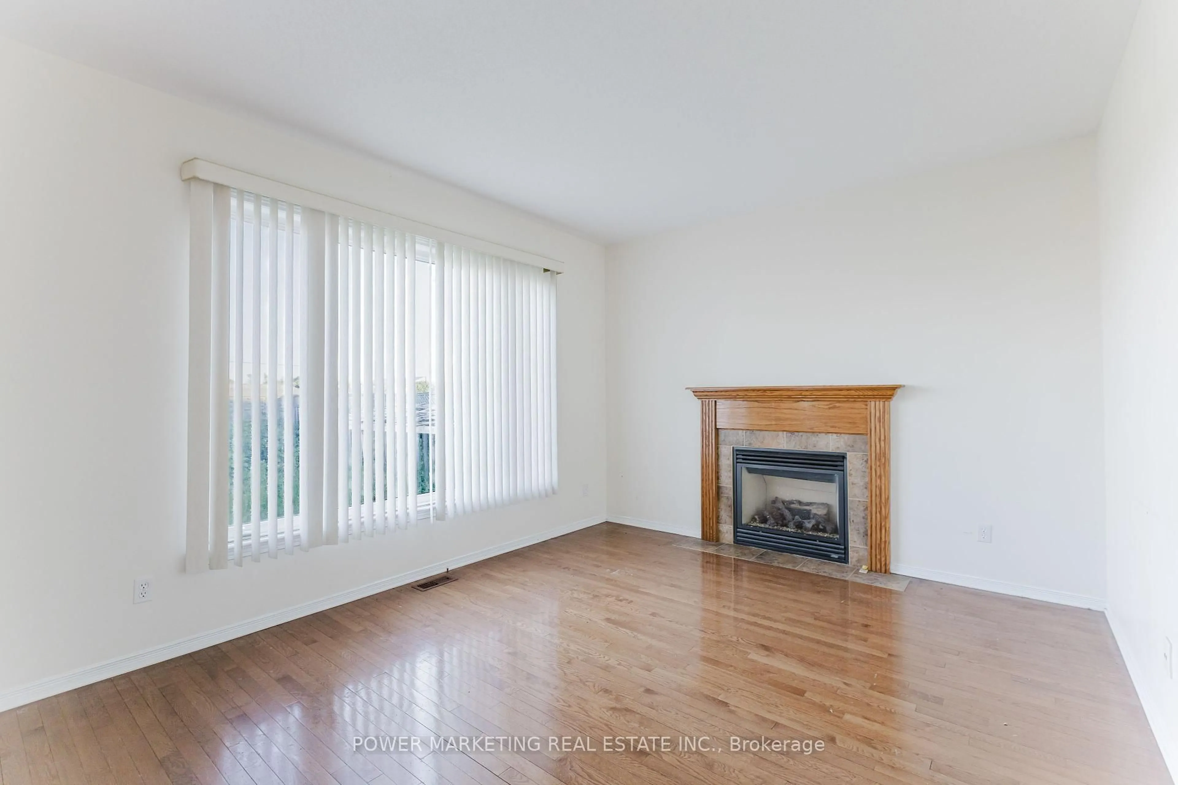 Living room with furniture, wood/laminate floor for 318 Rustic Hills Cres, Ottawa Ontario K4A 5A8
