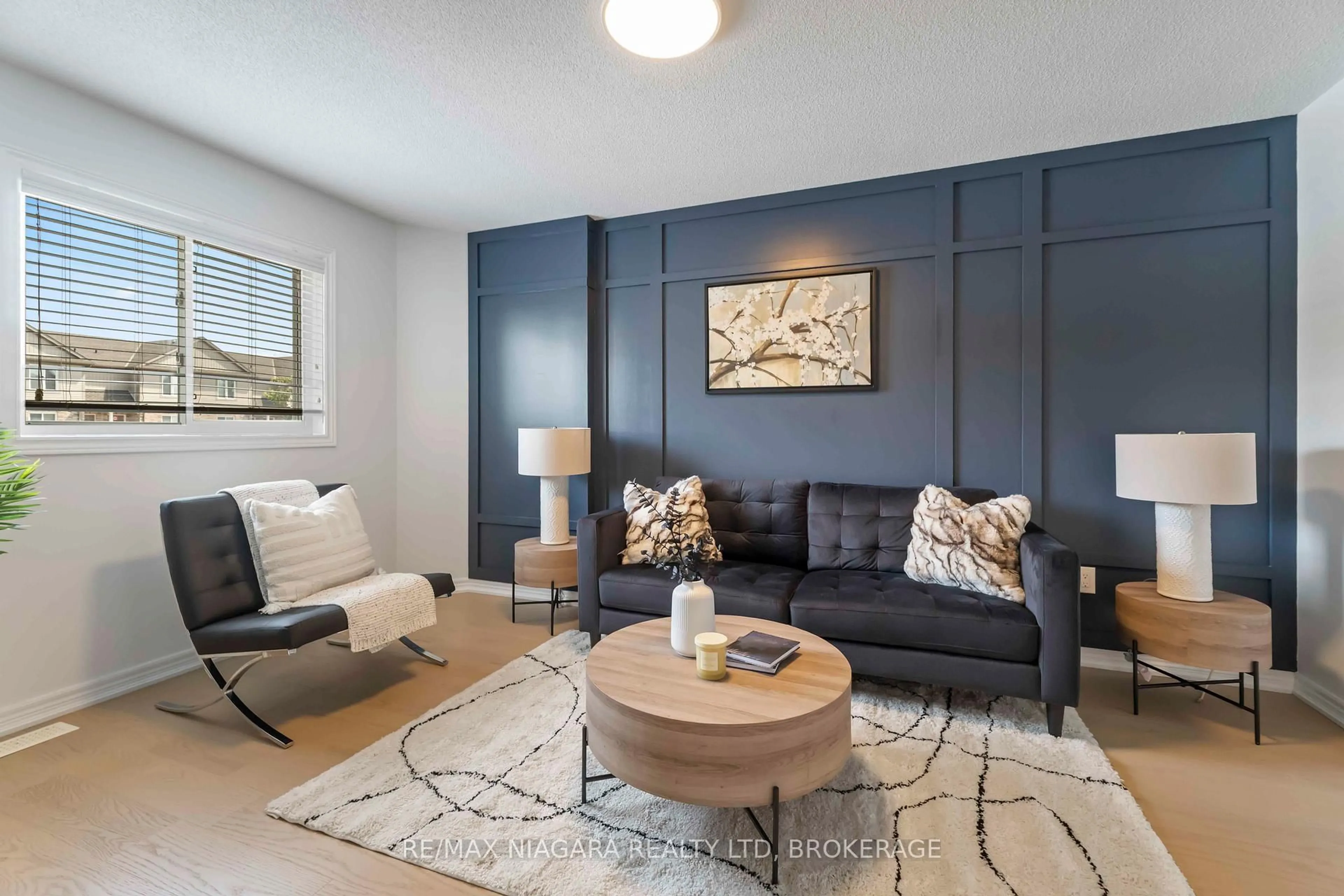 Living room with furniture, unknown for 6117 Kelsey Cres #10, Niagara Falls Ontario L2H 0L6