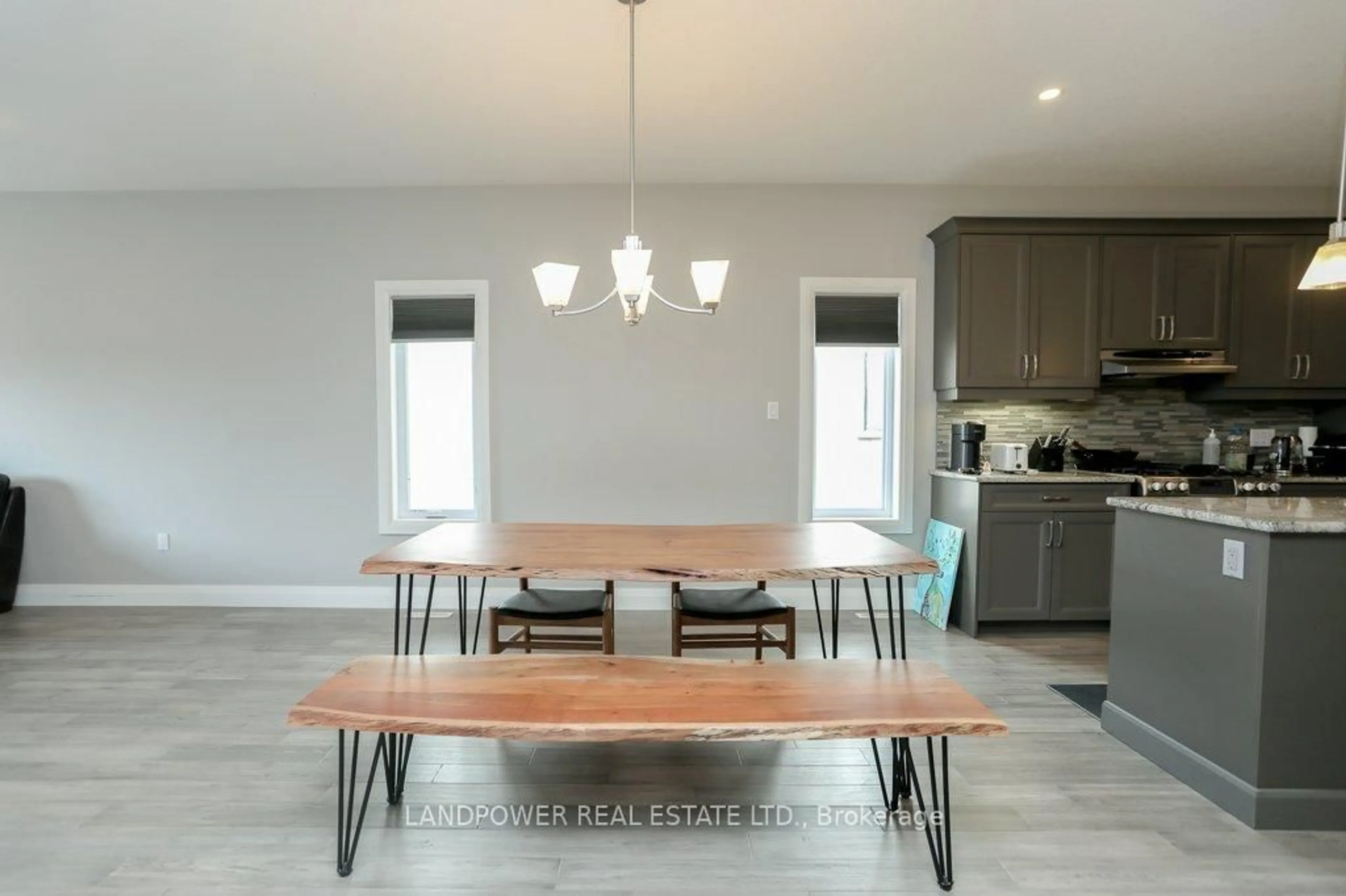 Open concept kitchen, wood/laminate floor for 3235 Raleigh Cres, London South Ontario N6P 0E4