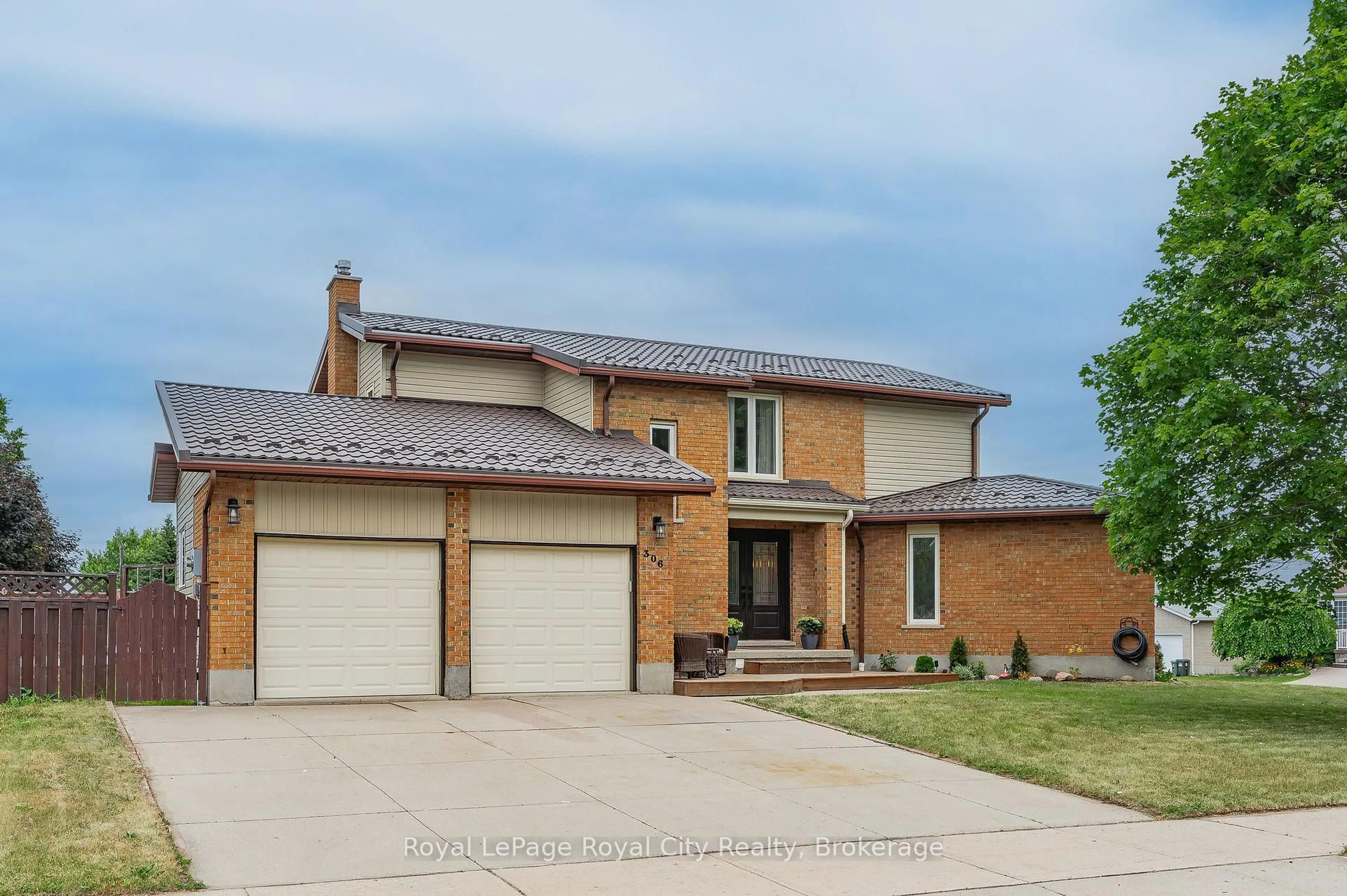 Home with brick exterior material, street for 306 Imperial Rd, Guelph Ontario N1K 1M4