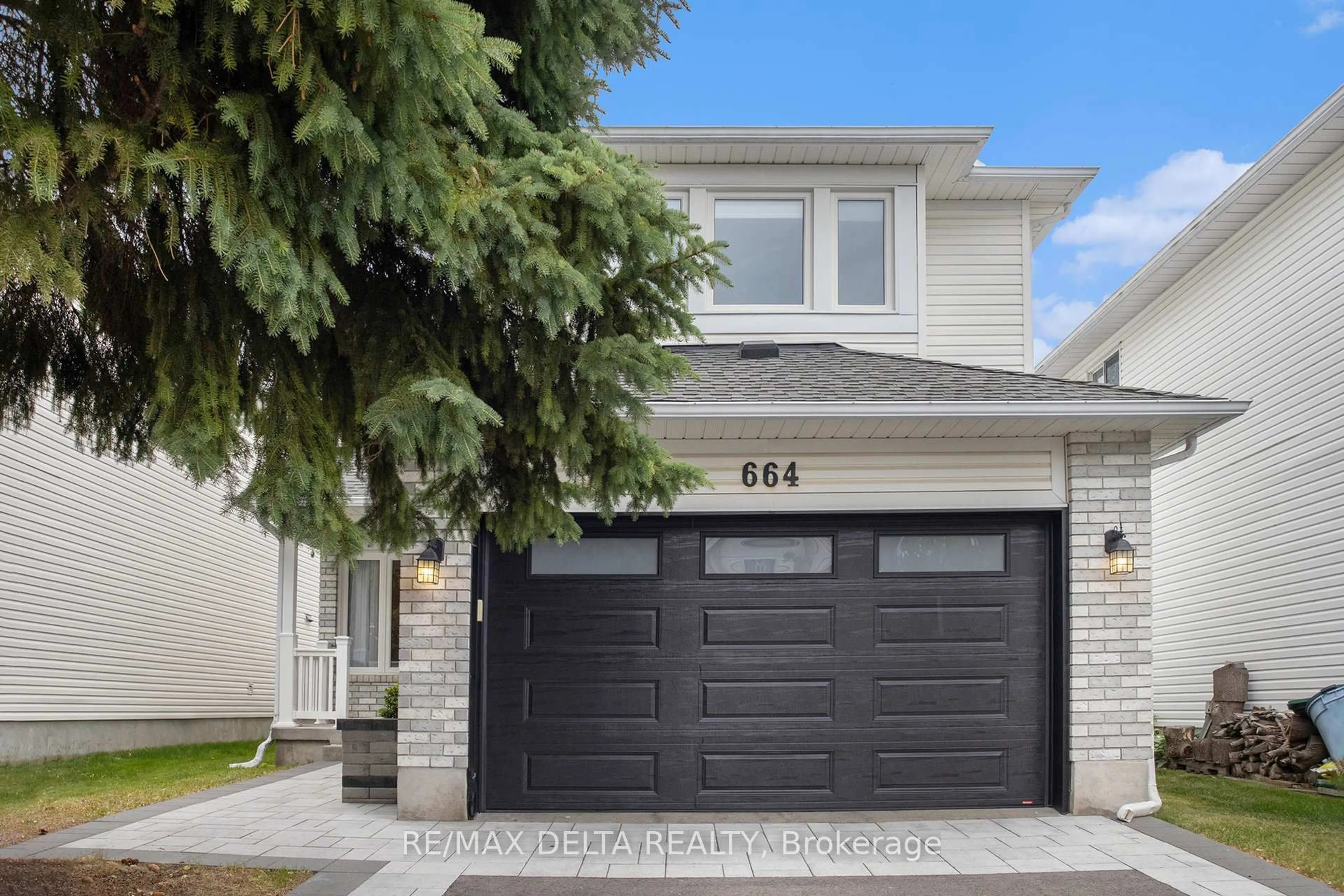 Home with vinyl exterior material, street for 664 Arc-En-Ciel St, Orleans Ontario K4A 3H8