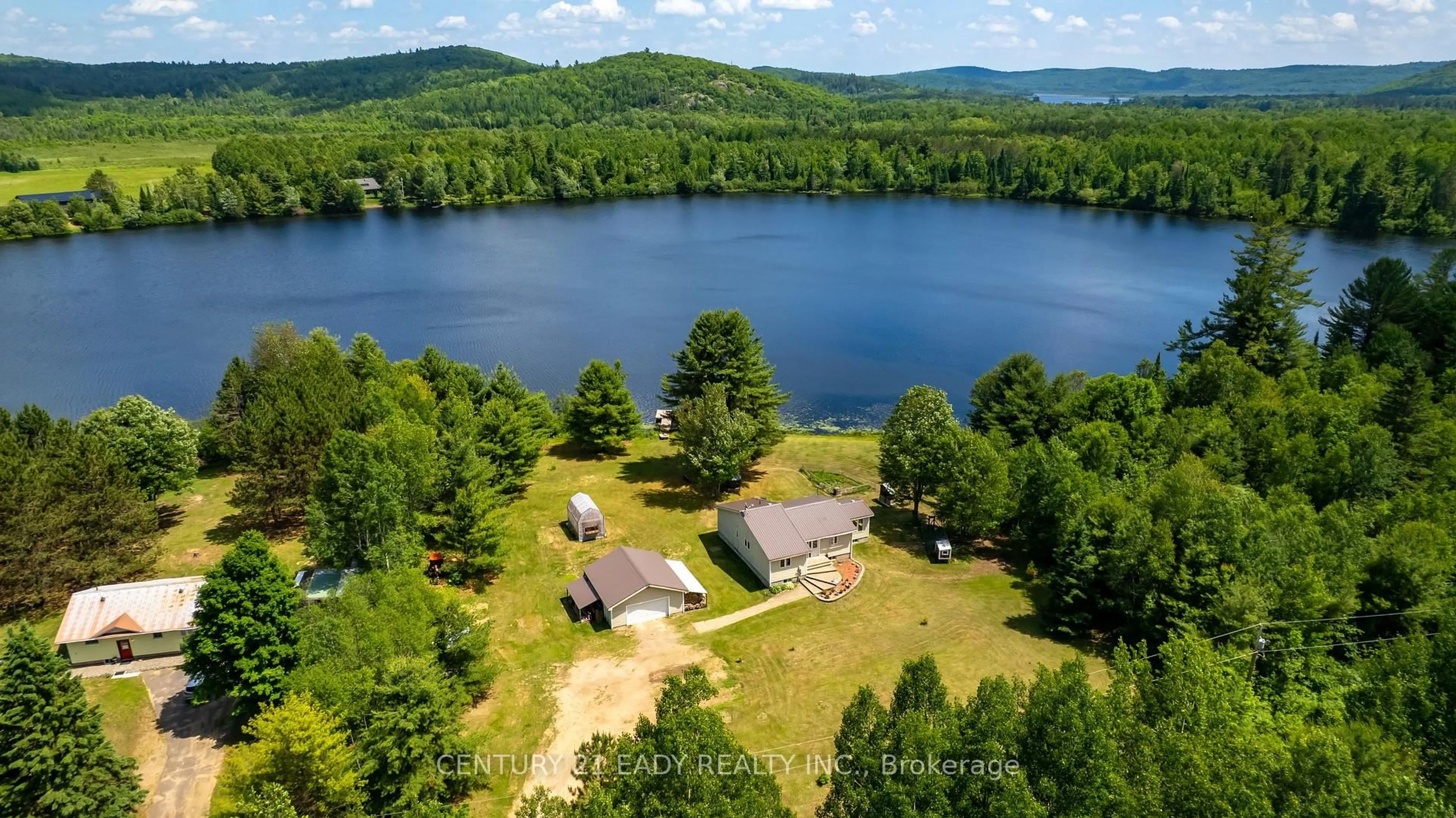 A pic from outside/outdoor area/front of a property/back of a property/a pic from drone, water/lake/river/ocean view for 51 Fran Stell Dr, Combermere Ontario K0J 1L0