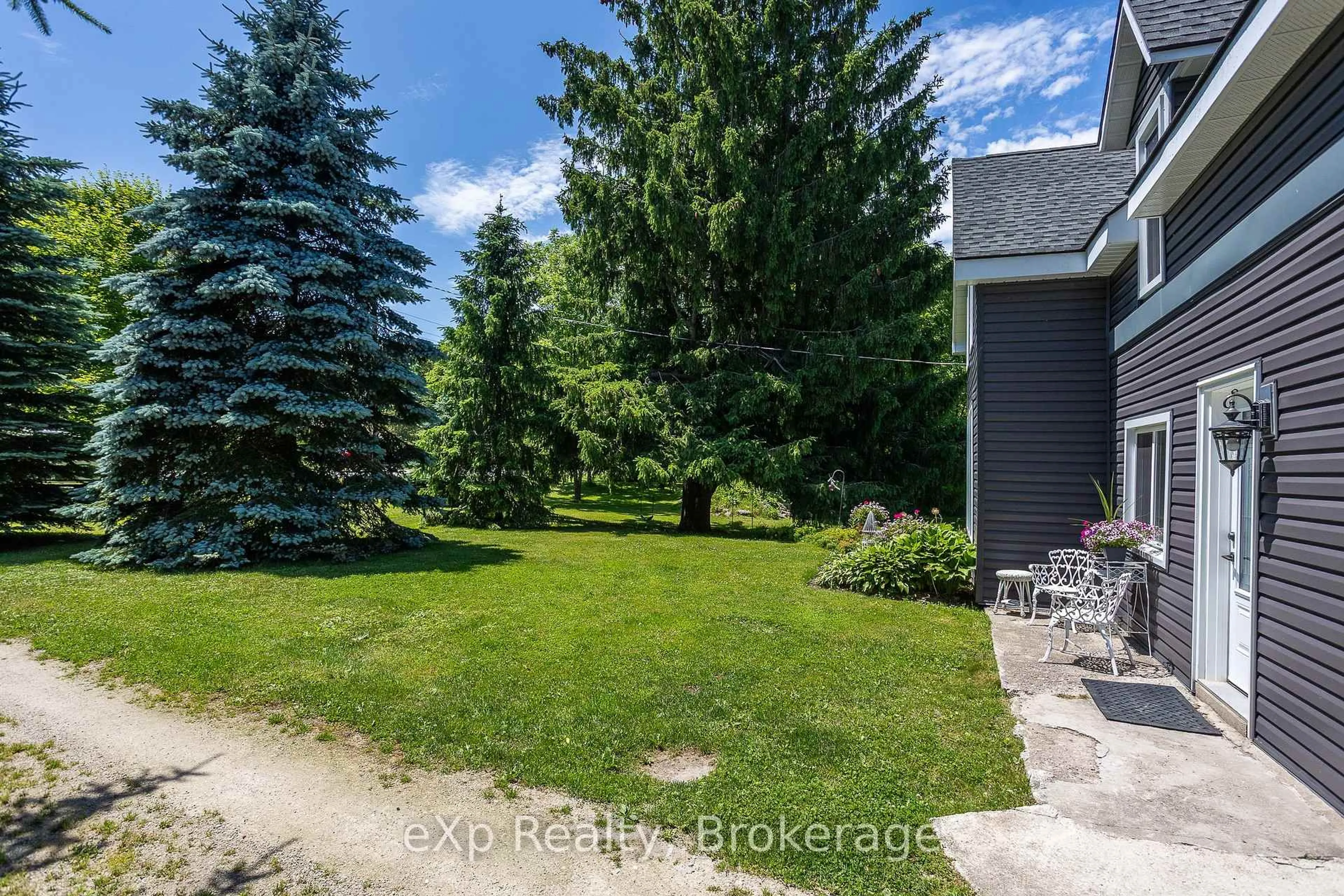A pic from outside/outdoor area/front of a property/back of a property/a pic from drone, street for 719015 6 Highway, Georgian Bluffs Ontario N0H 2K0