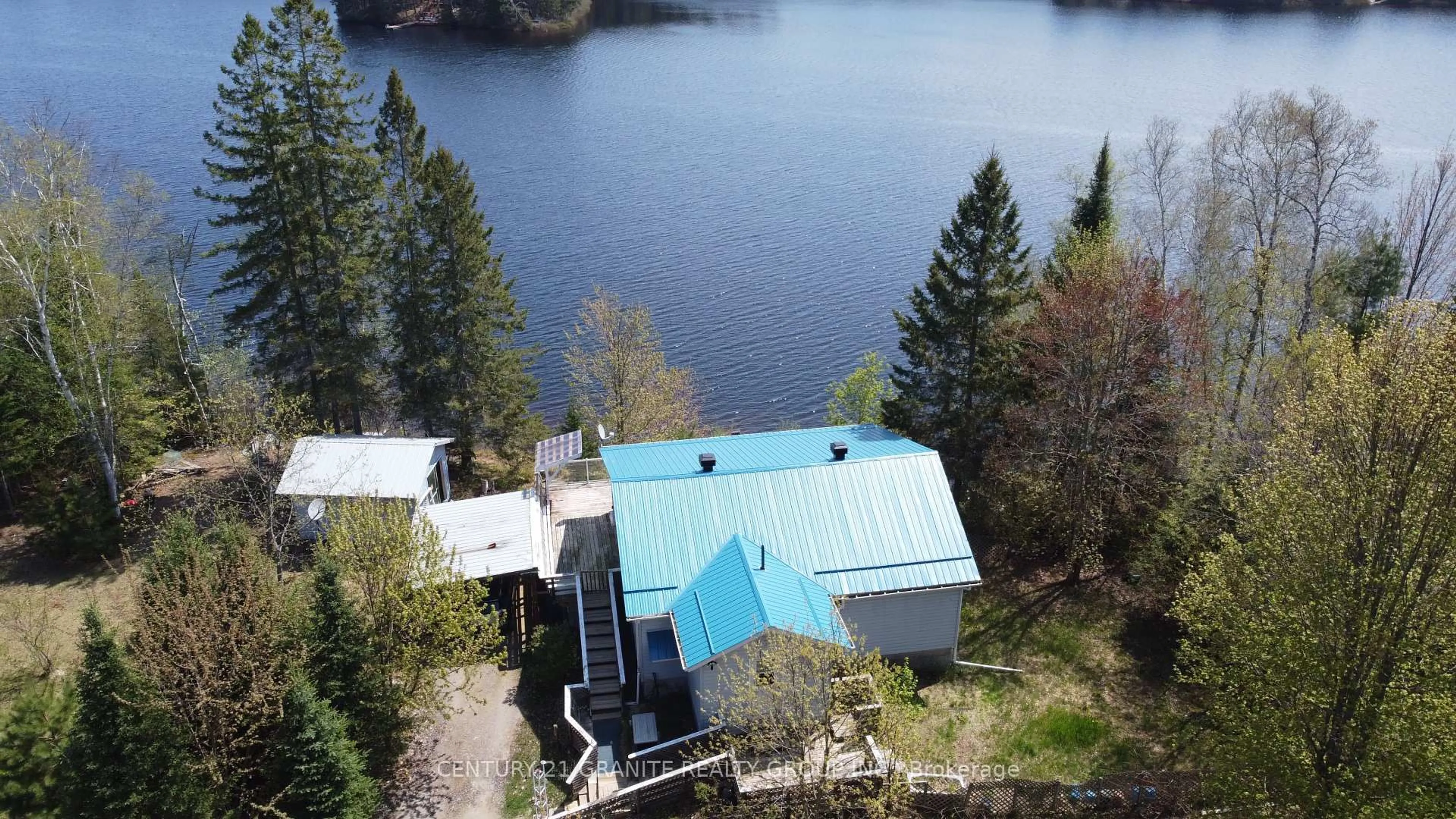 A pic from outside/outdoor area/front of a property/back of a property/a pic from drone, water/lake/river/ocean view for 192 Circle Rd, Hastings Highlands Ontario K0L 1J0