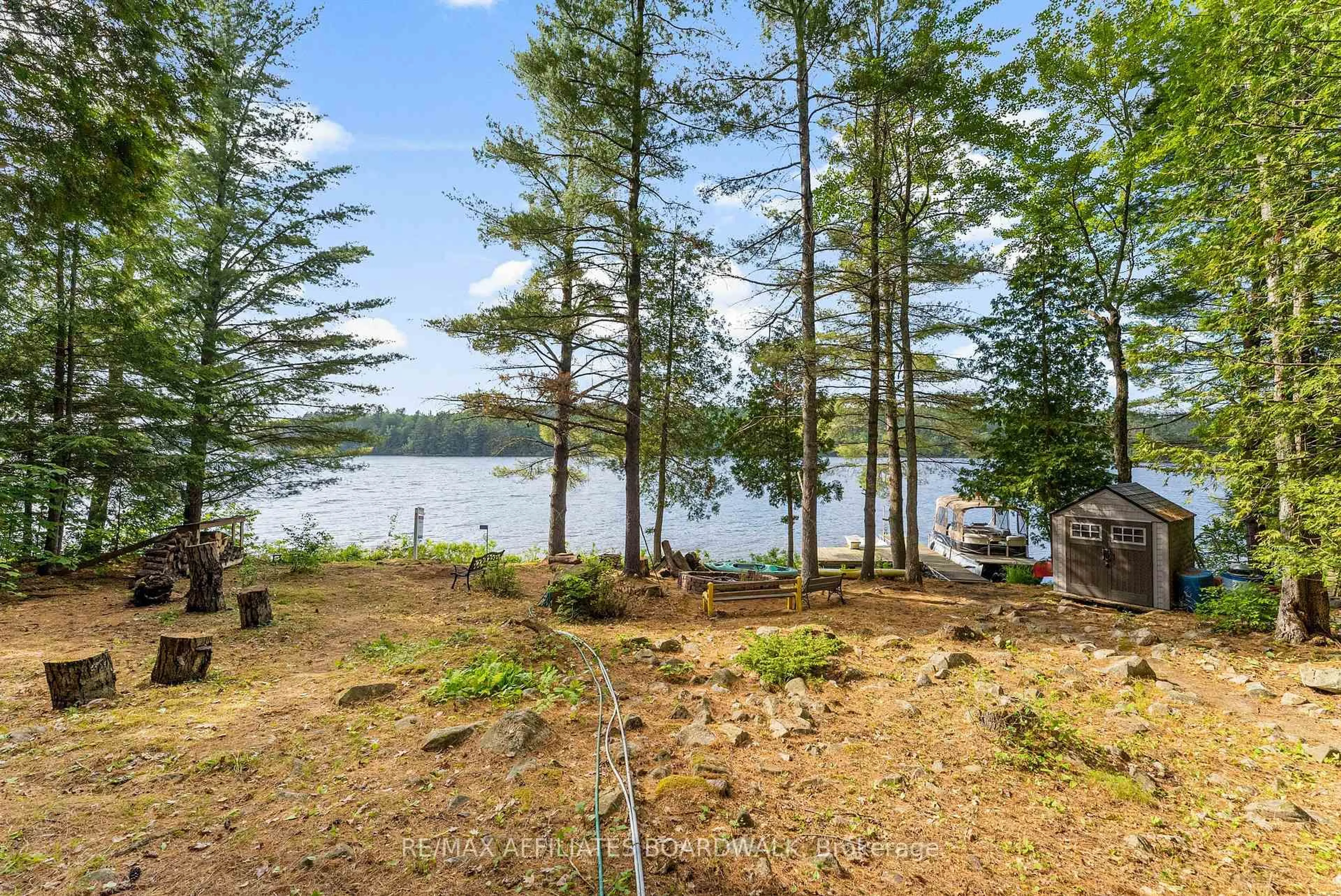 Patio, water/lake/river/ocean view for 3280 Upper Mazinaw Lake Rd, Cloyne Ontario K0H 1K0