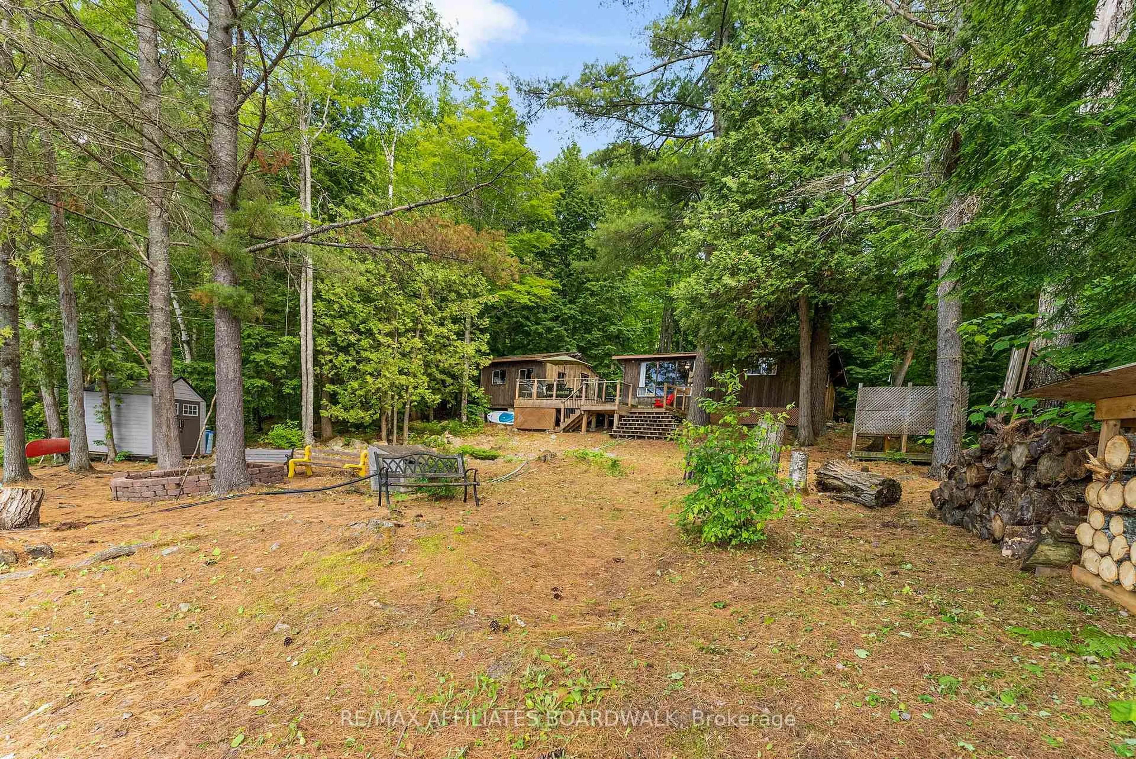 A pic from outside/outdoor area/front of a property/back of a property/a pic from drone, forest/trees view for 3280 Upper Mazinaw Lake Rd, Cloyne Ontario K0H 1K0