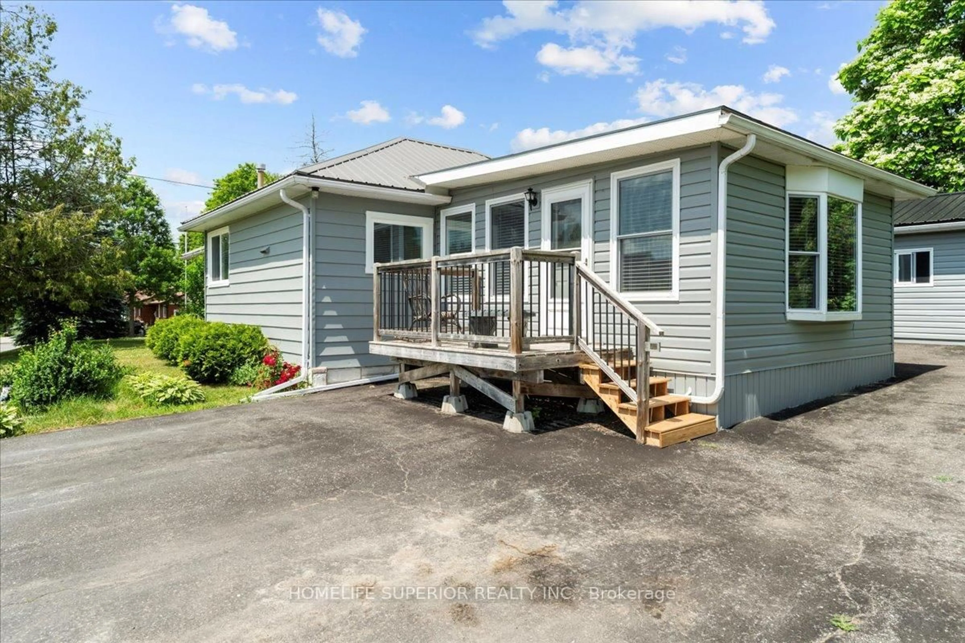 Home with vinyl exterior material, street for 118 Hastings Ave, Limoges Ontario K0K 2M0