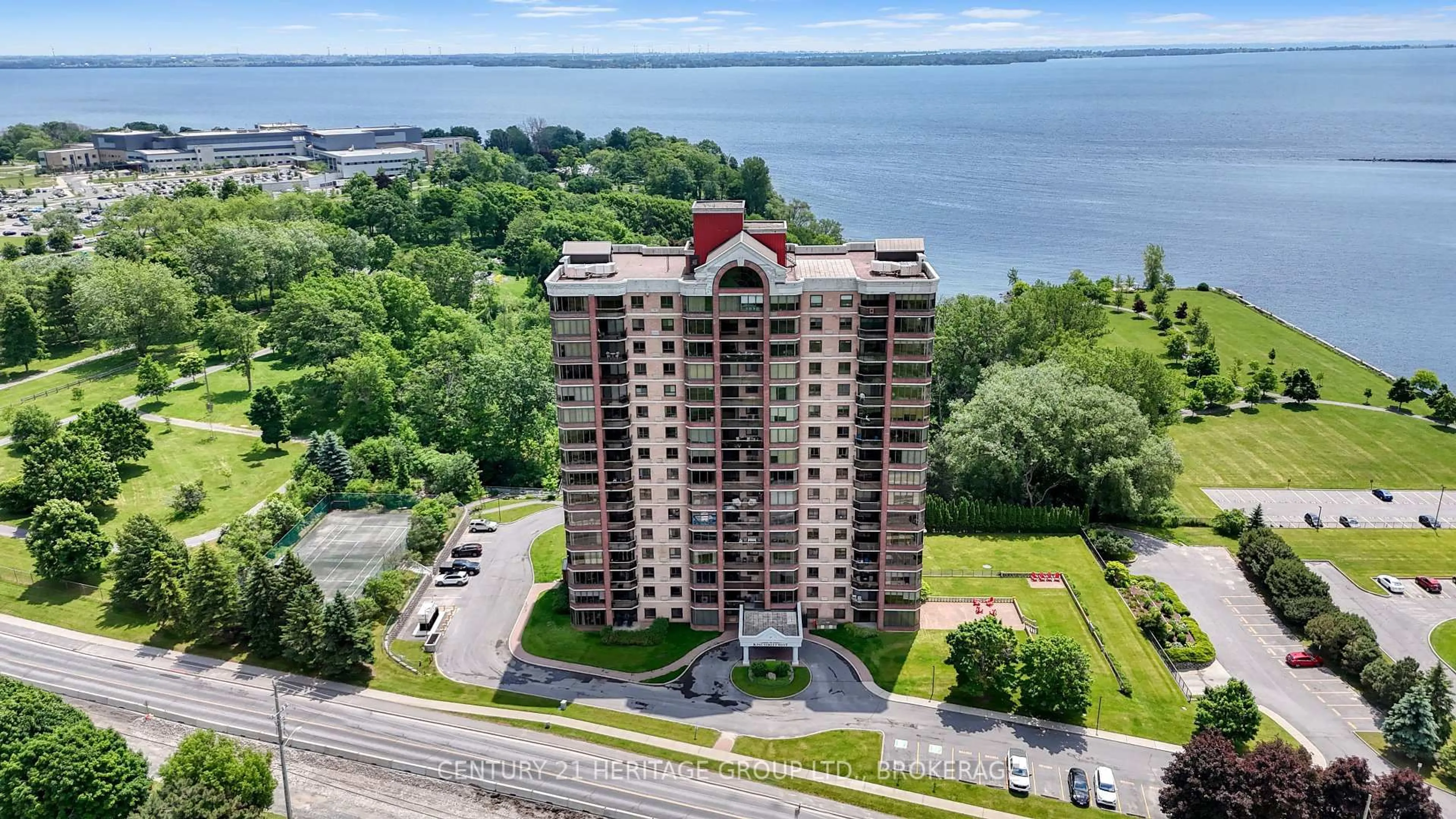 A pic from outside/outdoor area/front of a property/back of a property/a pic from drone, water/lake/river/ocean view for 1000 King St #1404, Kingston Ontario K7M 8H3