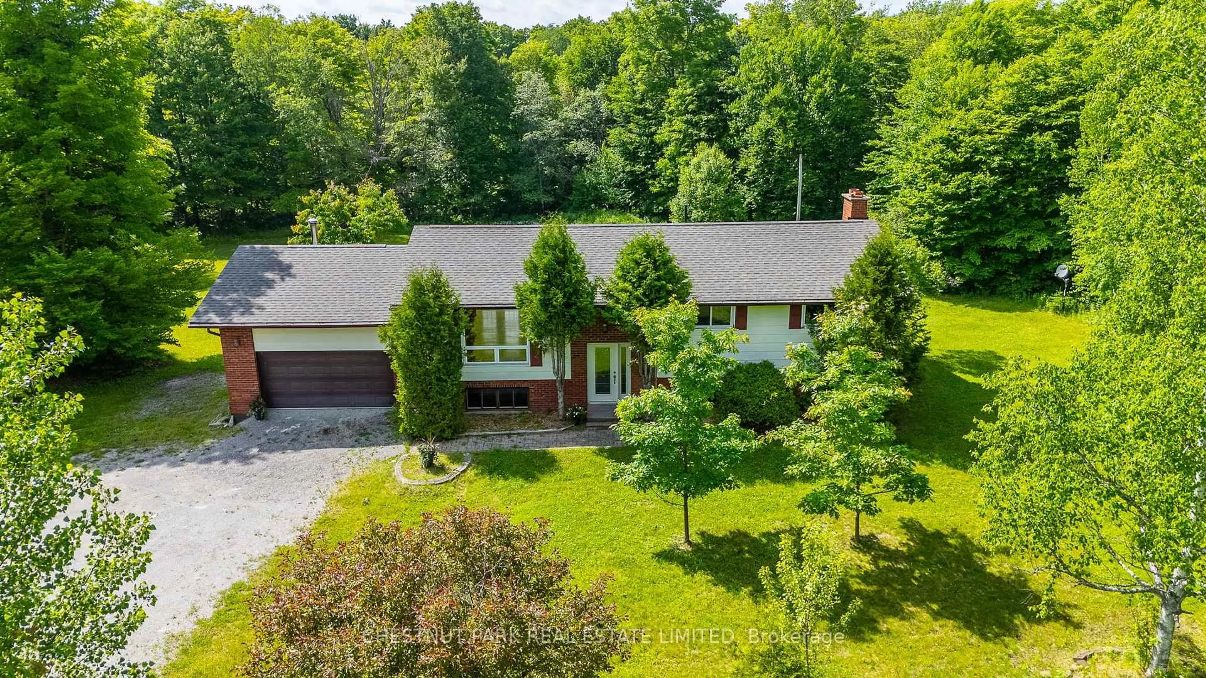 A pic from outside/outdoor area/front of a property/back of a property/a pic from drone, street for 4135 Kennisis Lake Rd, Dysart et al Ontario K0M 1S0