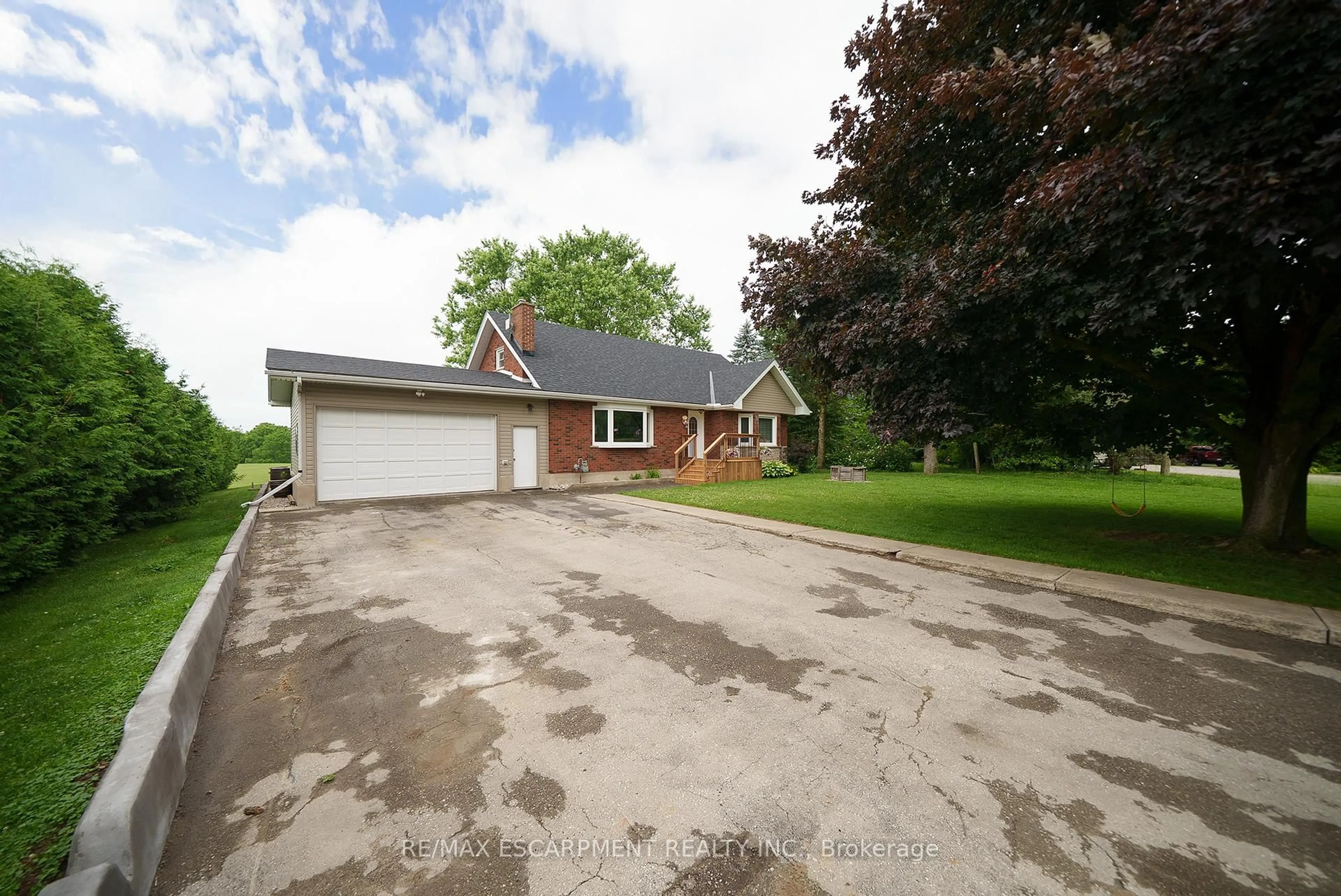 A pic from outside/outdoor area/front of a property/back of a property/a pic from drone, street for 45 River Rd, Brant Ontario N3R 0C1