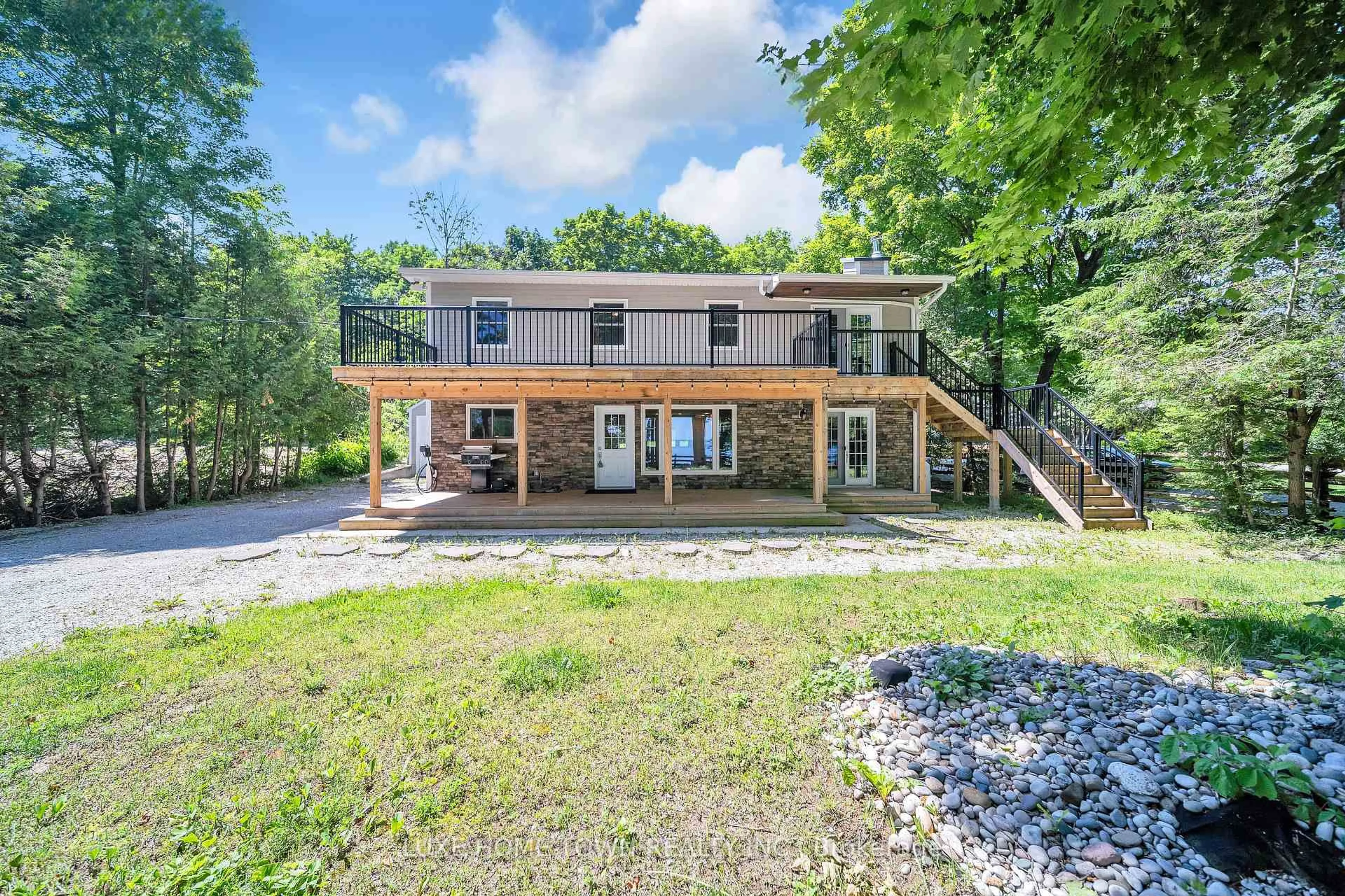 A pic from outside/outdoor area/front of a property/back of a property/a pic from drone, water/lake/river/ocean view for 339672 Presquile Rd, Georgian Bluffs Ontario N0H 1S0