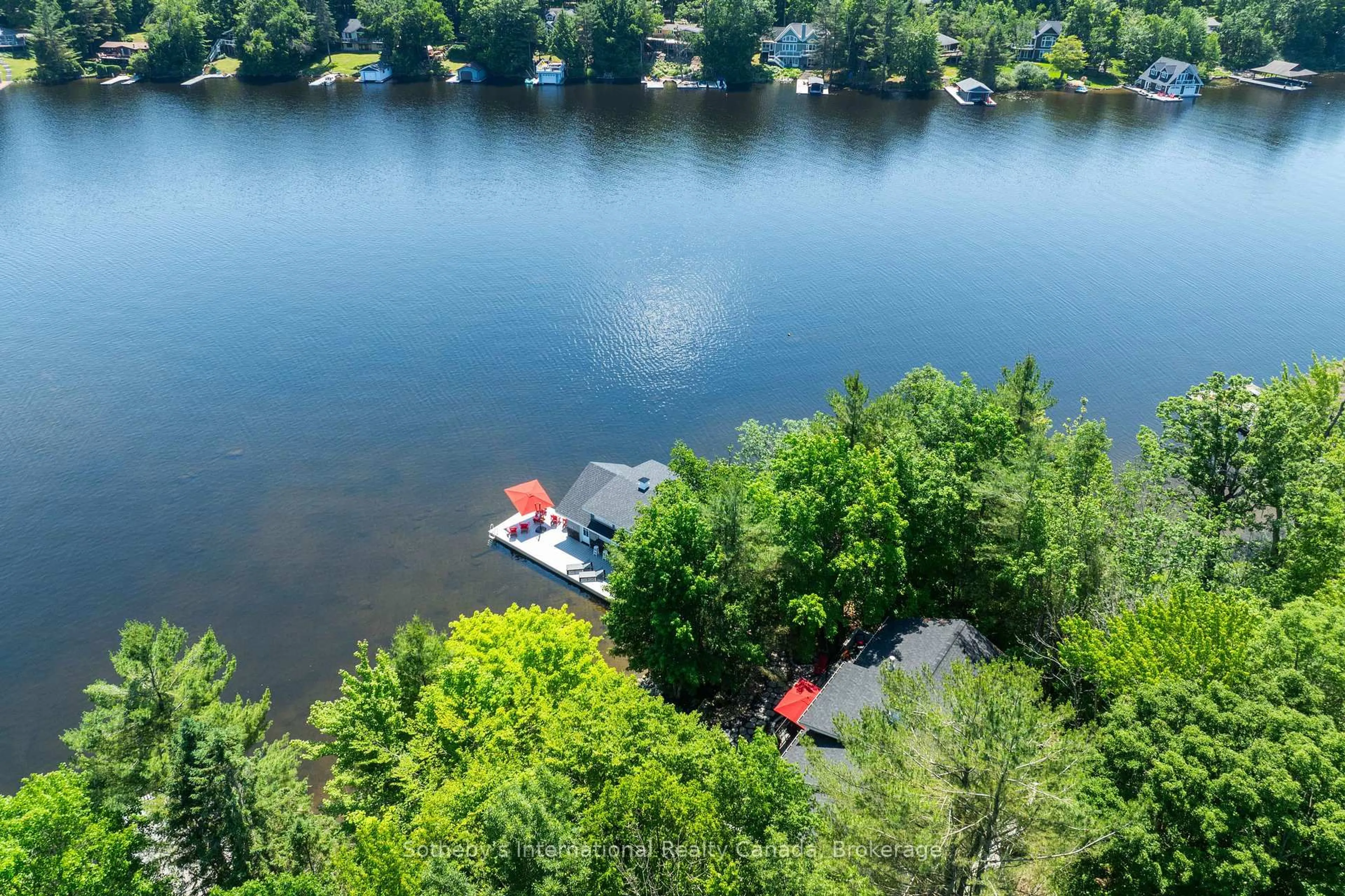 A pic from outside/outdoor area/front of a property/back of a property/a pic from drone, water/lake/river/ocean view for 3646 Muskoka Rd 169 Highway #Unit 12, Muskoka Lakes Ontario P0C 1A0