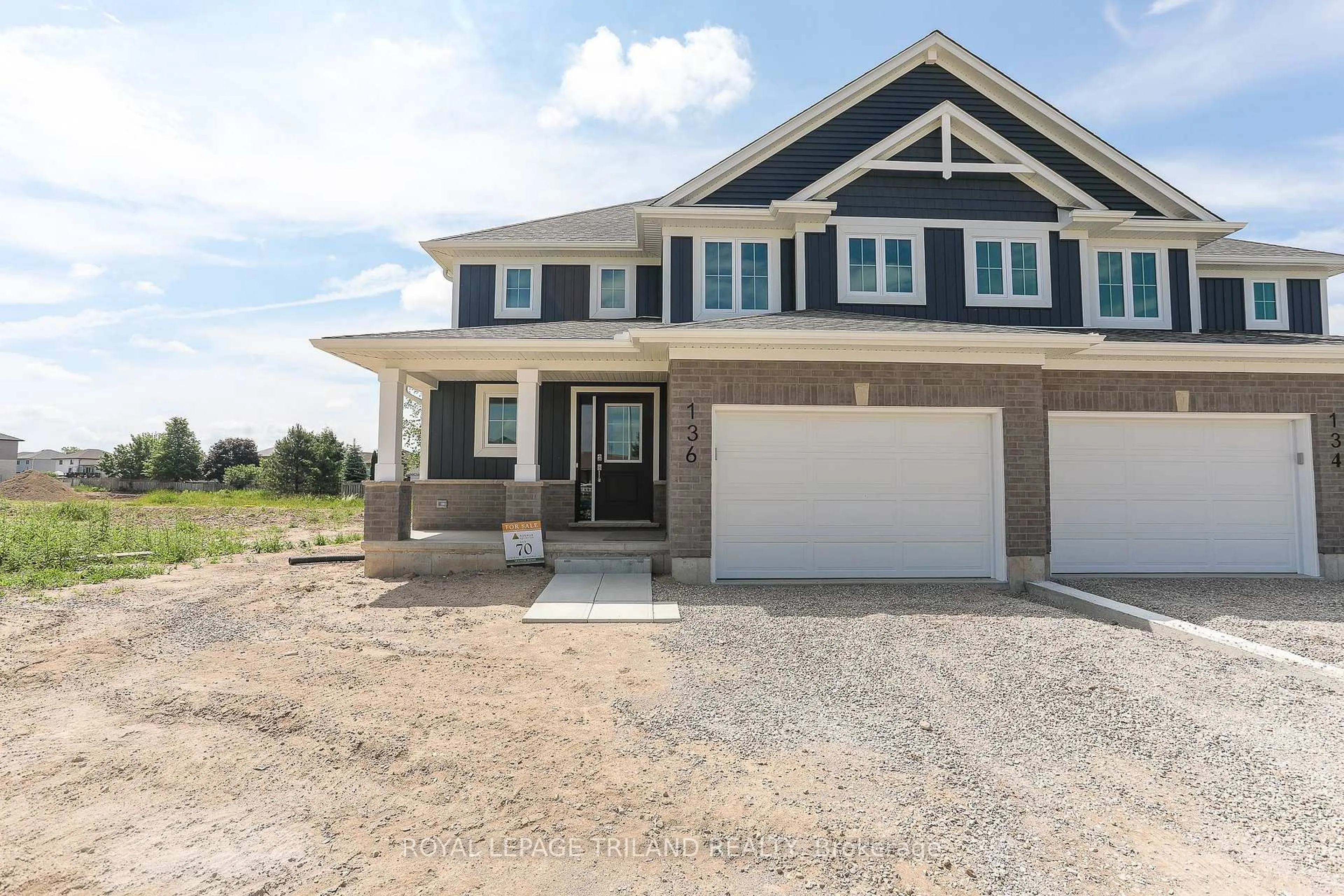 Home with vinyl exterior material, street for 136 Manor Rd, St. Thomas Ontario N5R 0R3