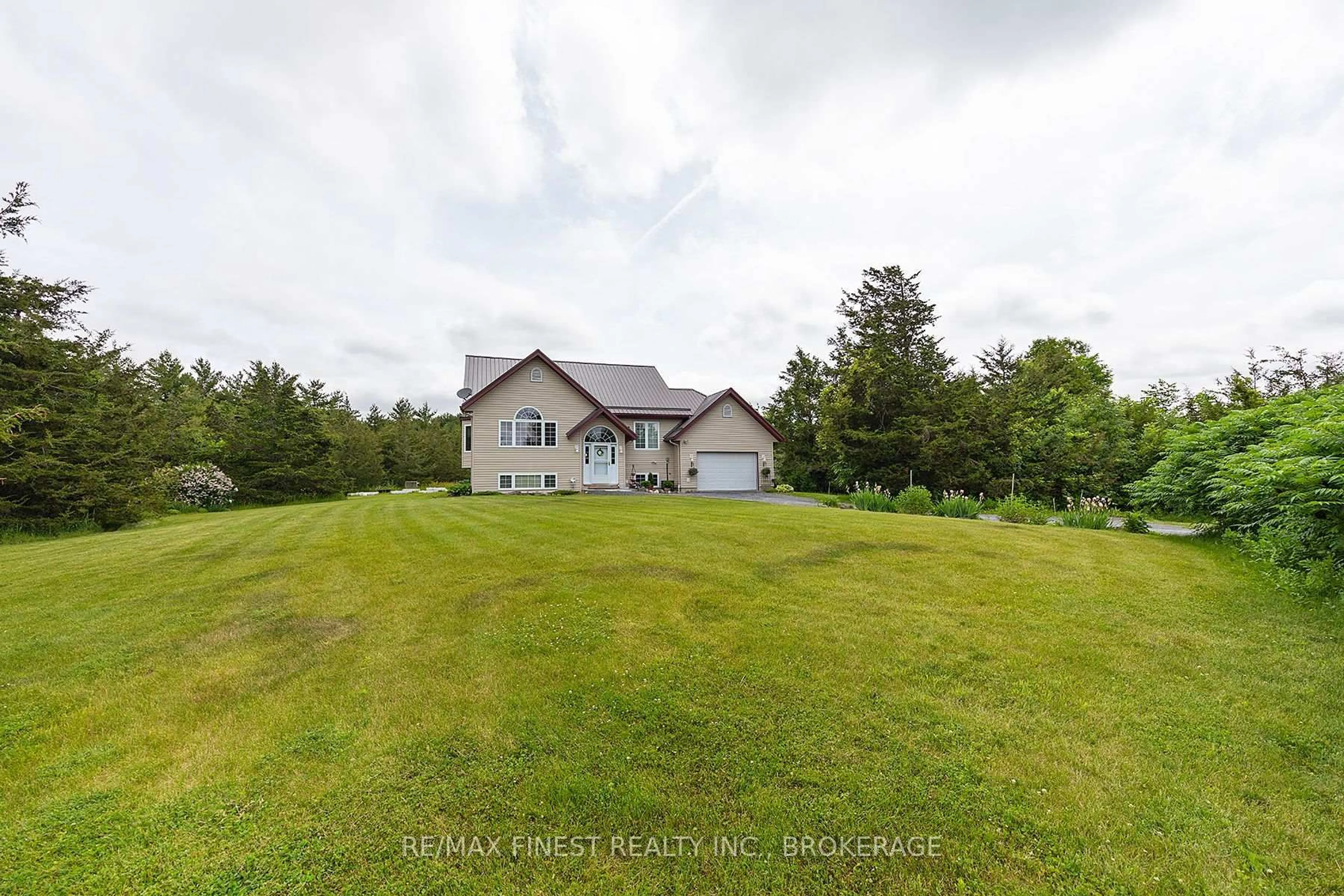 A pic from outside/outdoor area/front of a property/back of a property/a pic from drone, water/lake/river/ocean view for 23 Dowdle Rd, Newburgh Ontario K0K 2S0