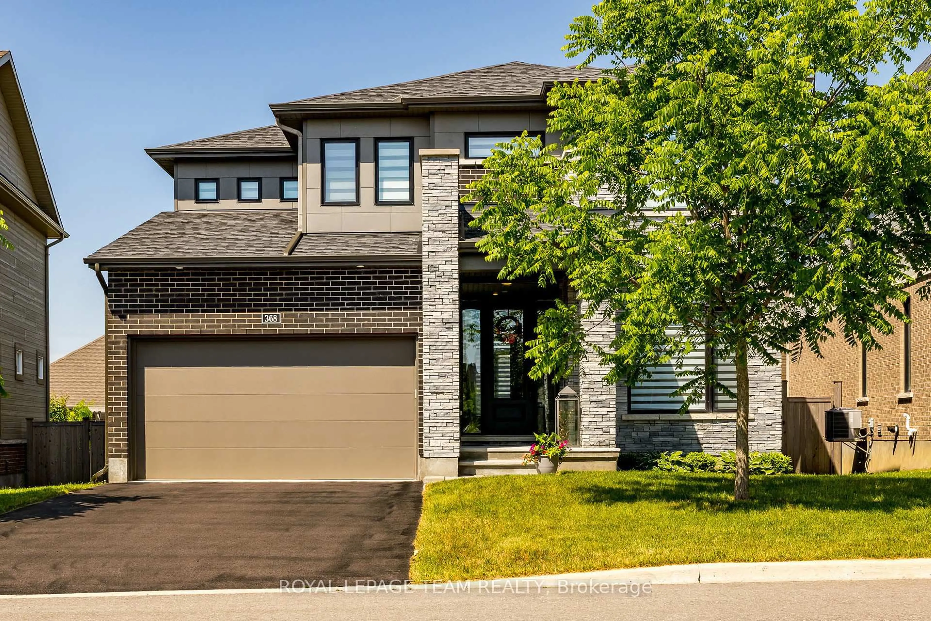 Home with brick exterior material, street for 368 Trestle St, Manotick Ontario K4M 0G4