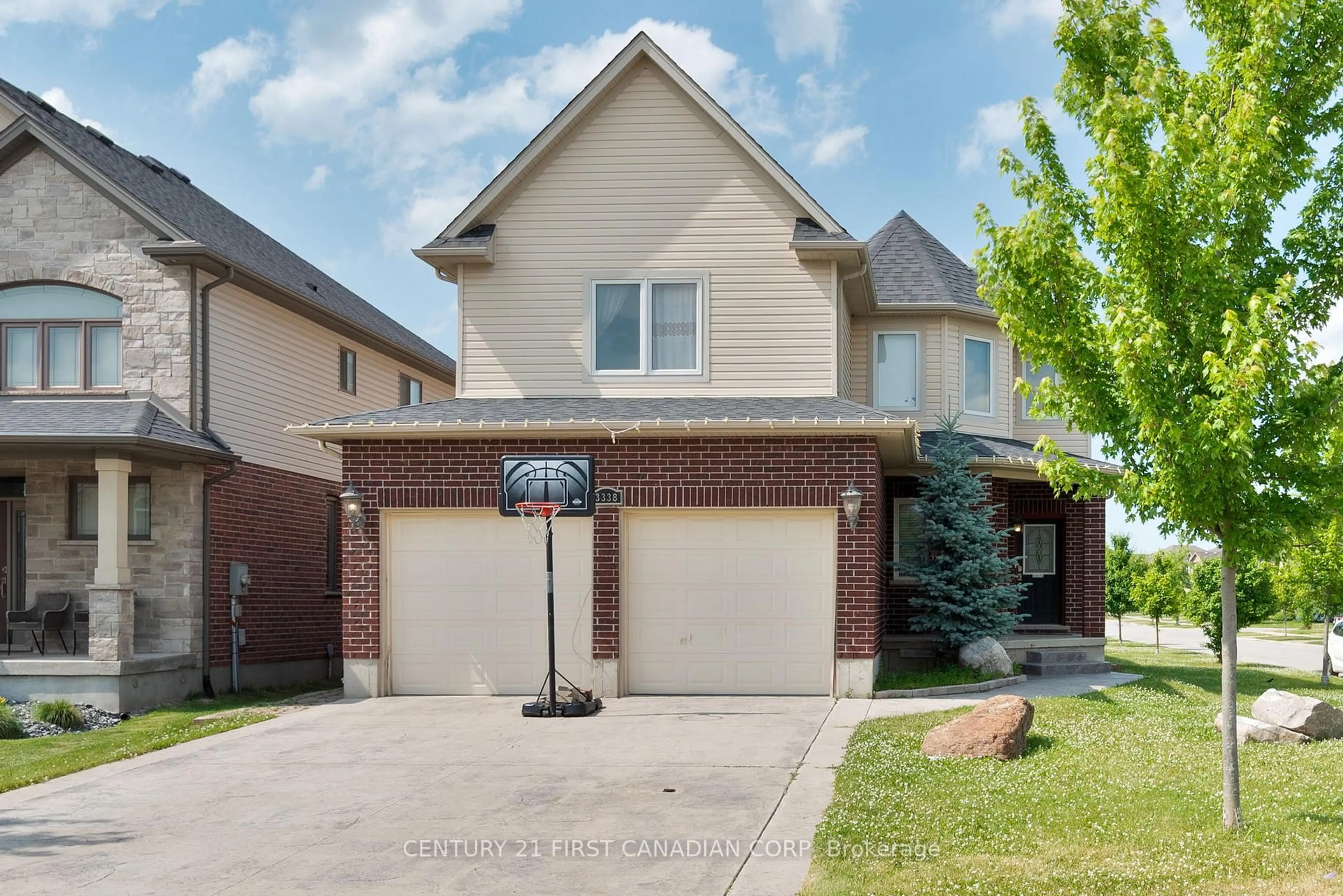 Home with brick exterior material, street for 3338 Jinnies Way, London South Ontario N6L 0C5
