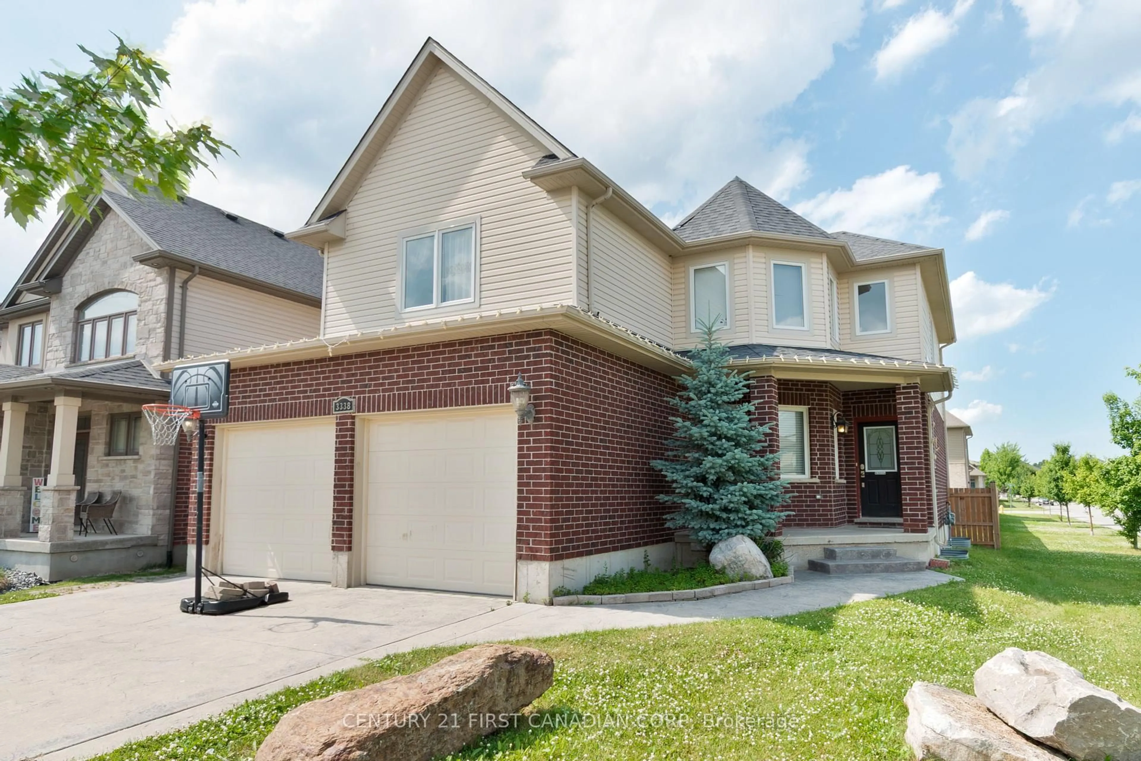 Home with brick exterior material, street for 3338 Jinnies Way, London South Ontario N6L 0C5