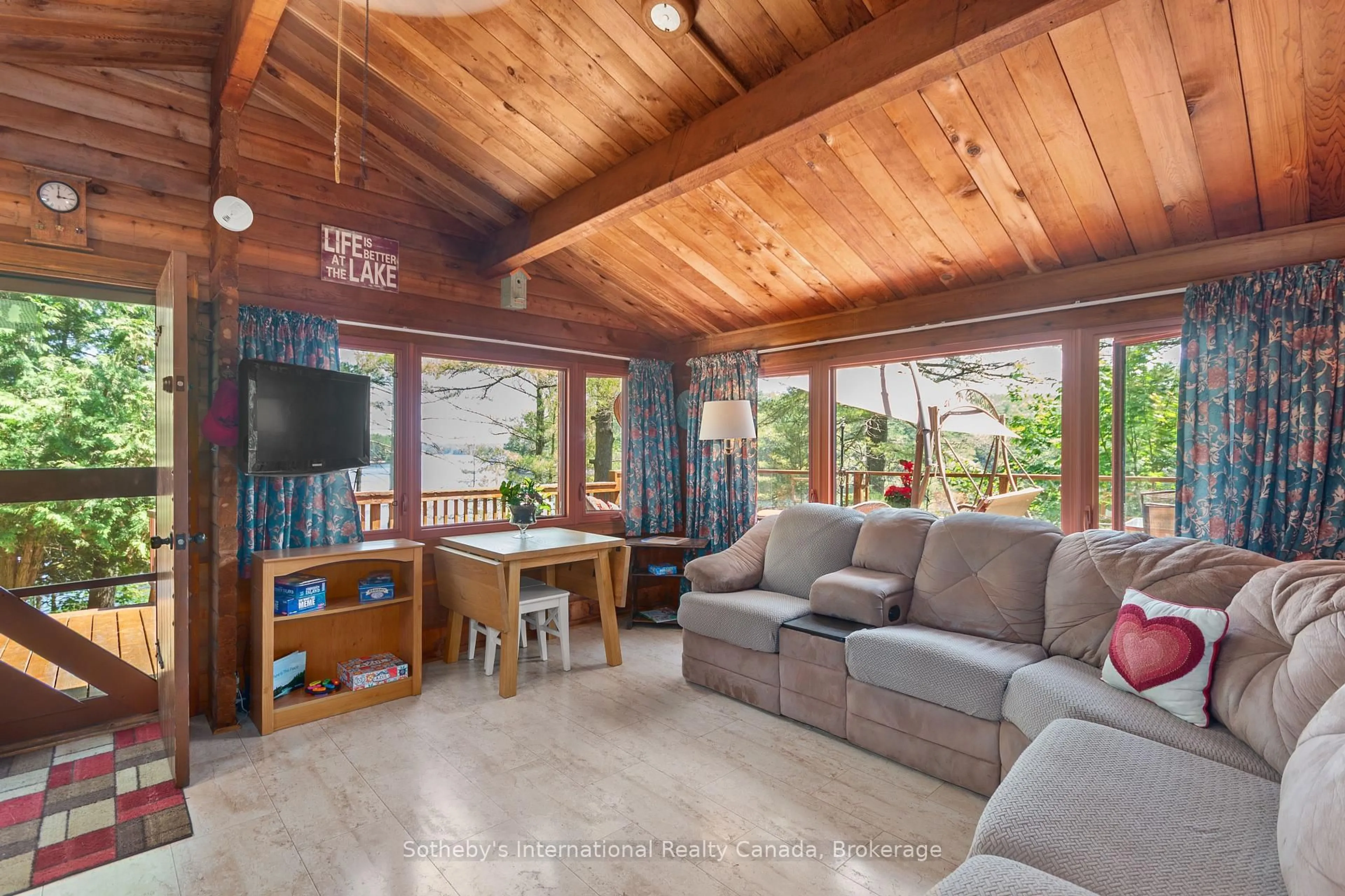 Living room with furniture, wood/laminate floor for 4 Is 50 Go Home Lake, Georgian Bay Ontario P0C 1H0