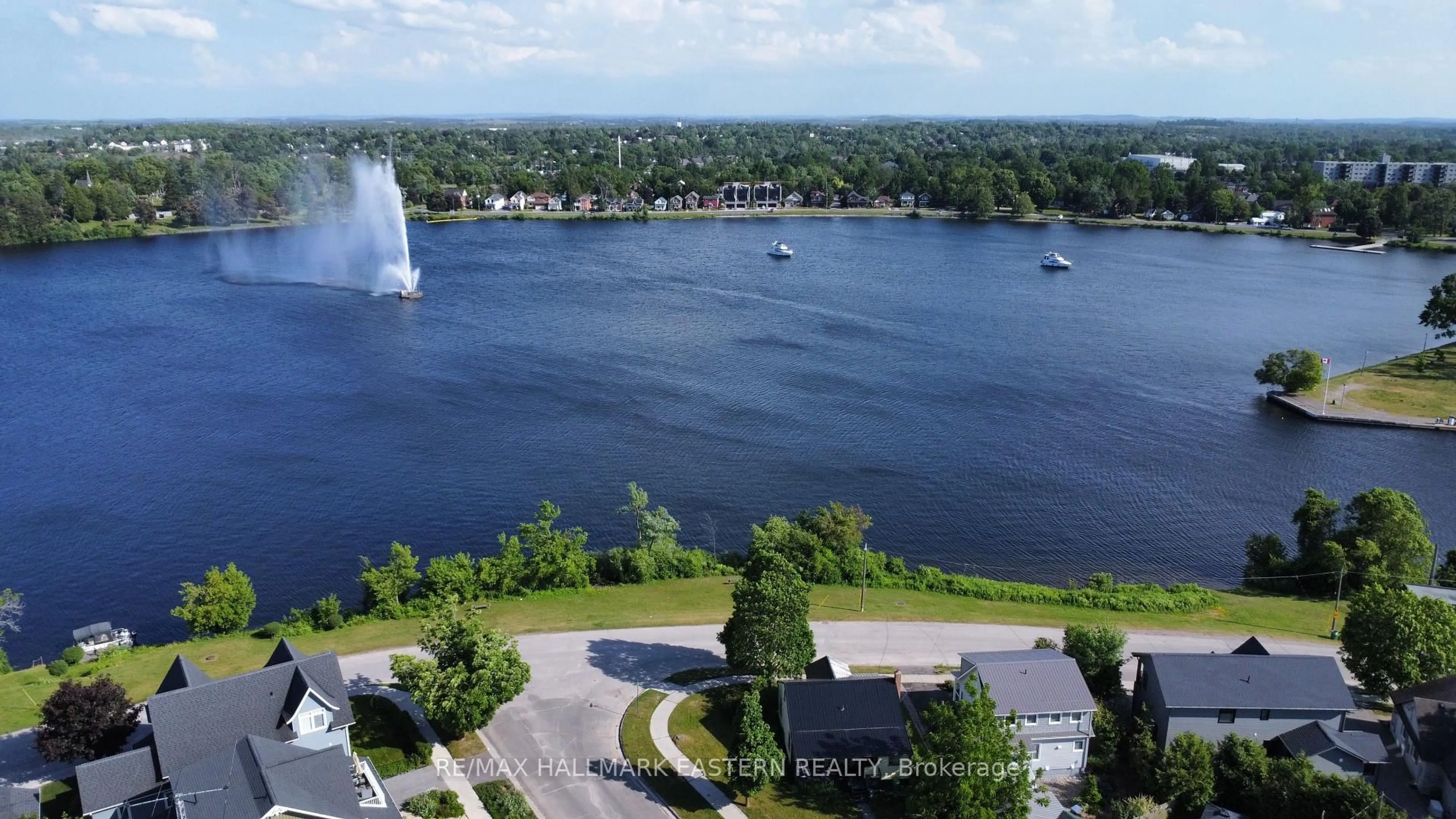 A pic from outside/outdoor area/front of a property/back of a property/a pic from drone, water/lake/river/ocean view for 63 EDGEWATER Blvd, Peterborough East Ontario K9H 1A4