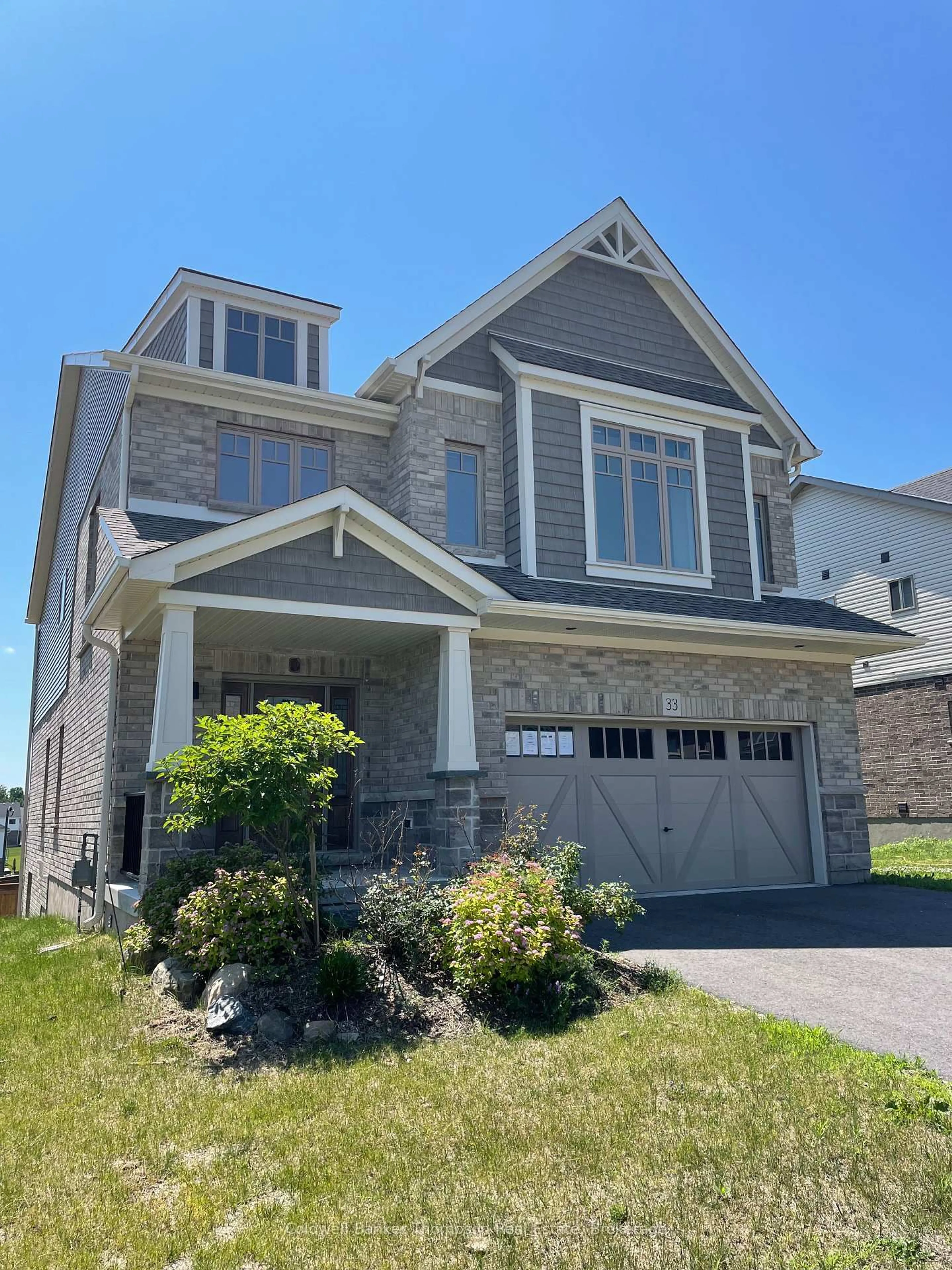 Home with brick exterior material, street for 33 WOODSTREAM Dr, Huntsville Ontario P1H 0B7