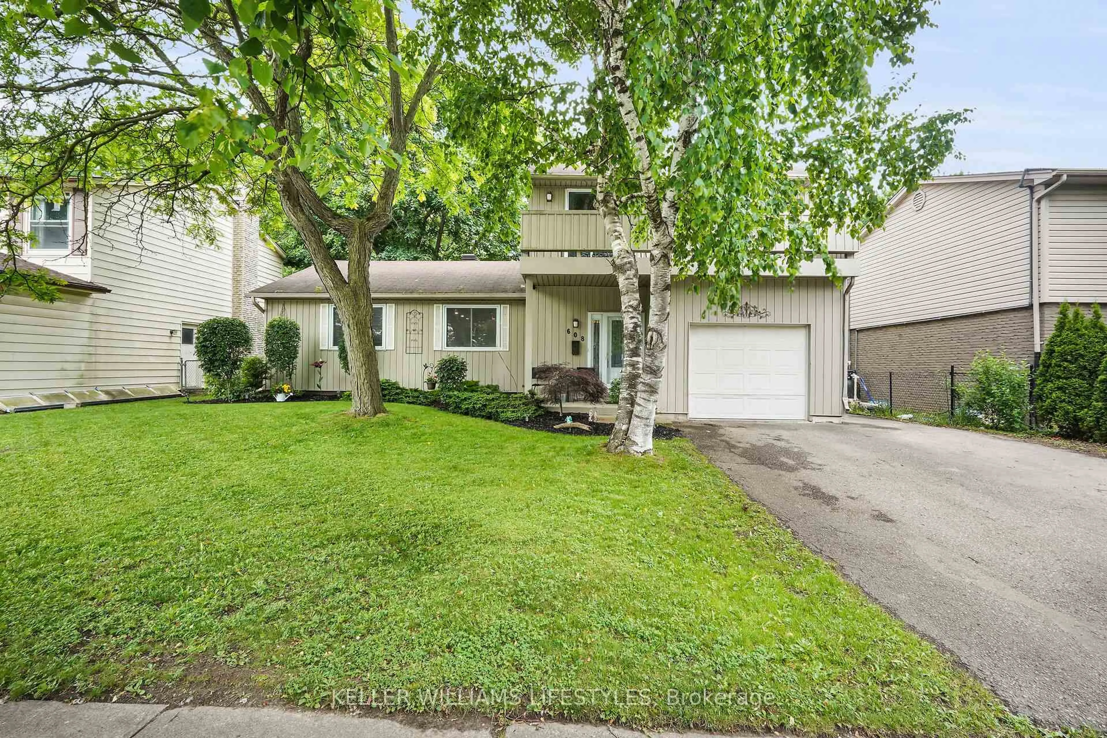 Home with vinyl exterior material, street for 608 Village Green Ave, London South Ontario N6K 1G5