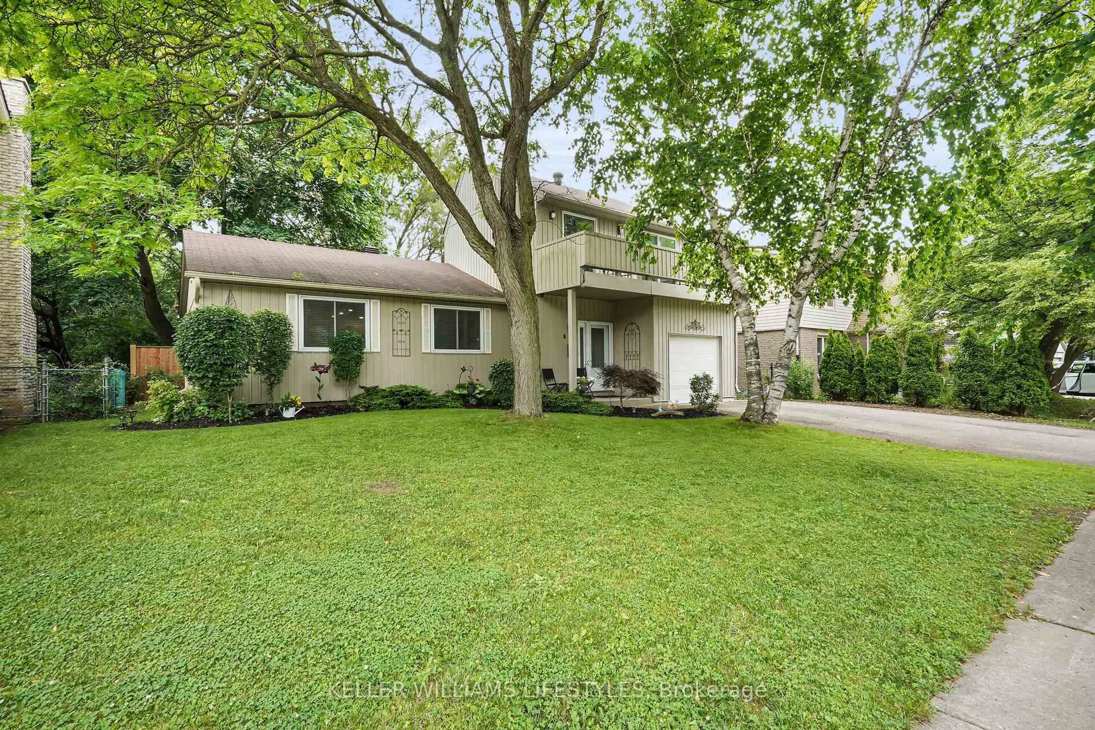 Home with vinyl exterior material, street for 608 Village Green Ave, London South Ontario N6K 1G5