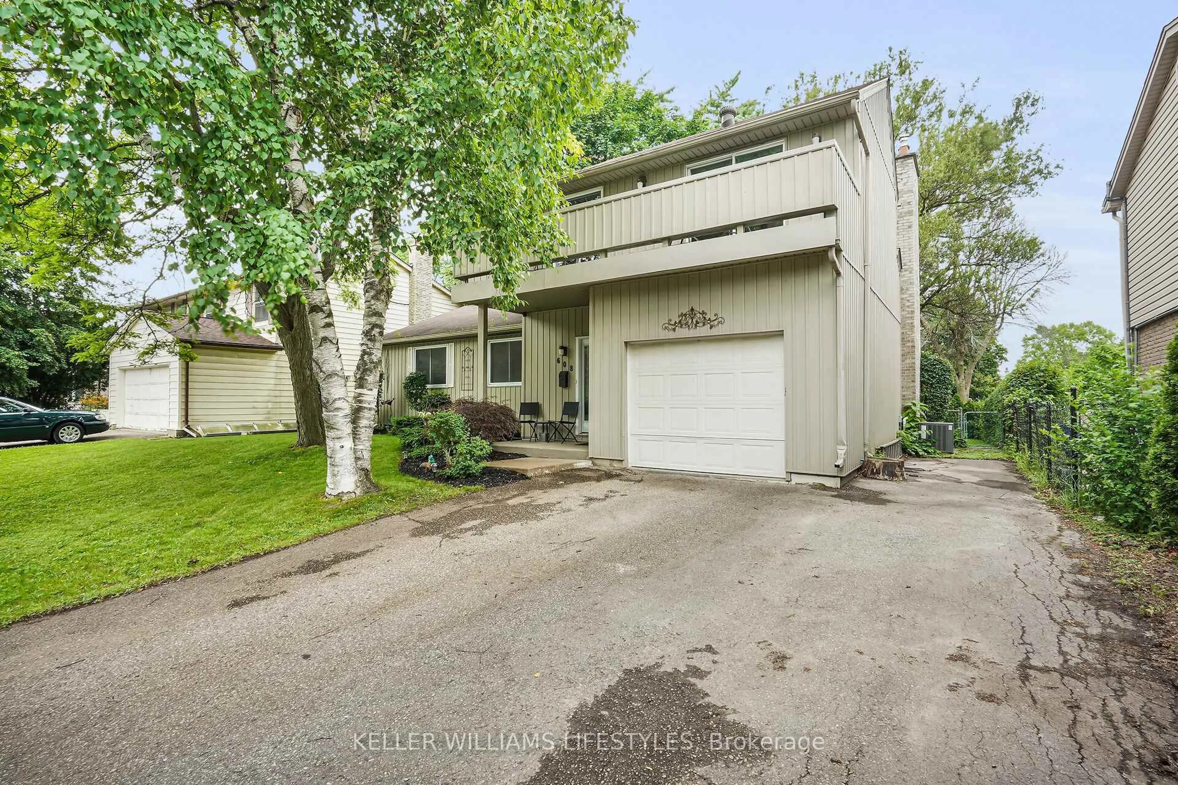 A pic from outside/outdoor area/front of a property/back of a property/a pic from drone, street for 608 Village Green Ave, London South Ontario N6K 1G5