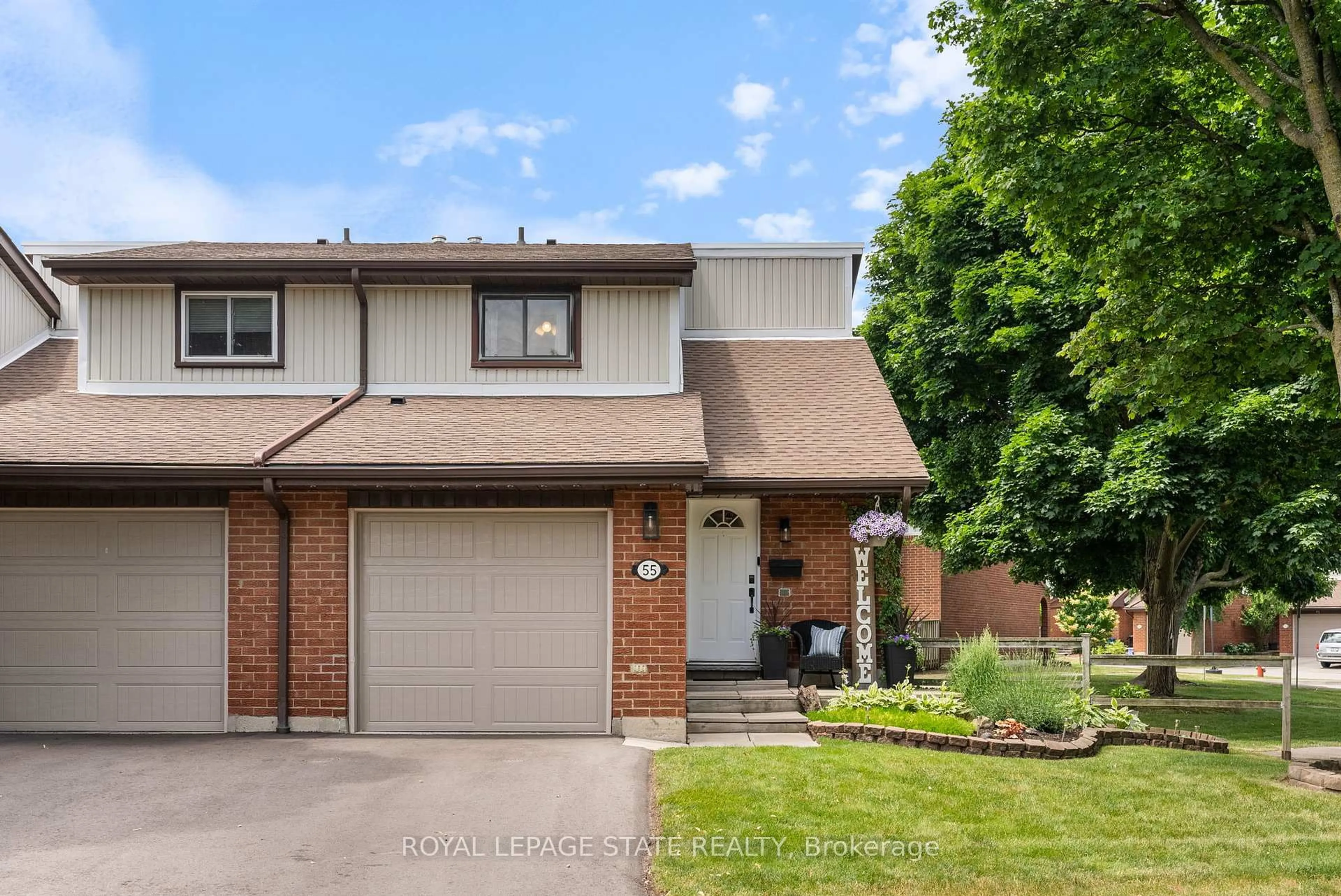 Home with brick exterior material, street for 25 Redbury St #55, Hamilton Ontario L8W 1P7
