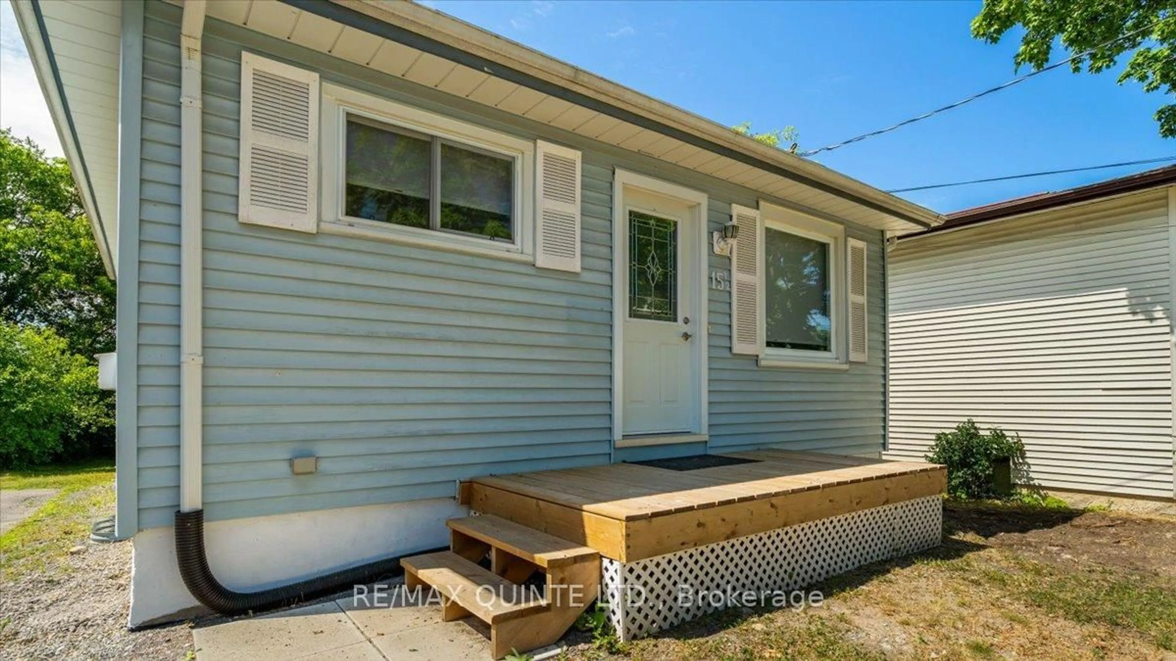 Home with vinyl exterior material, street for 15 1/2 McCann St, Quinte West Ontario K8V 1W2