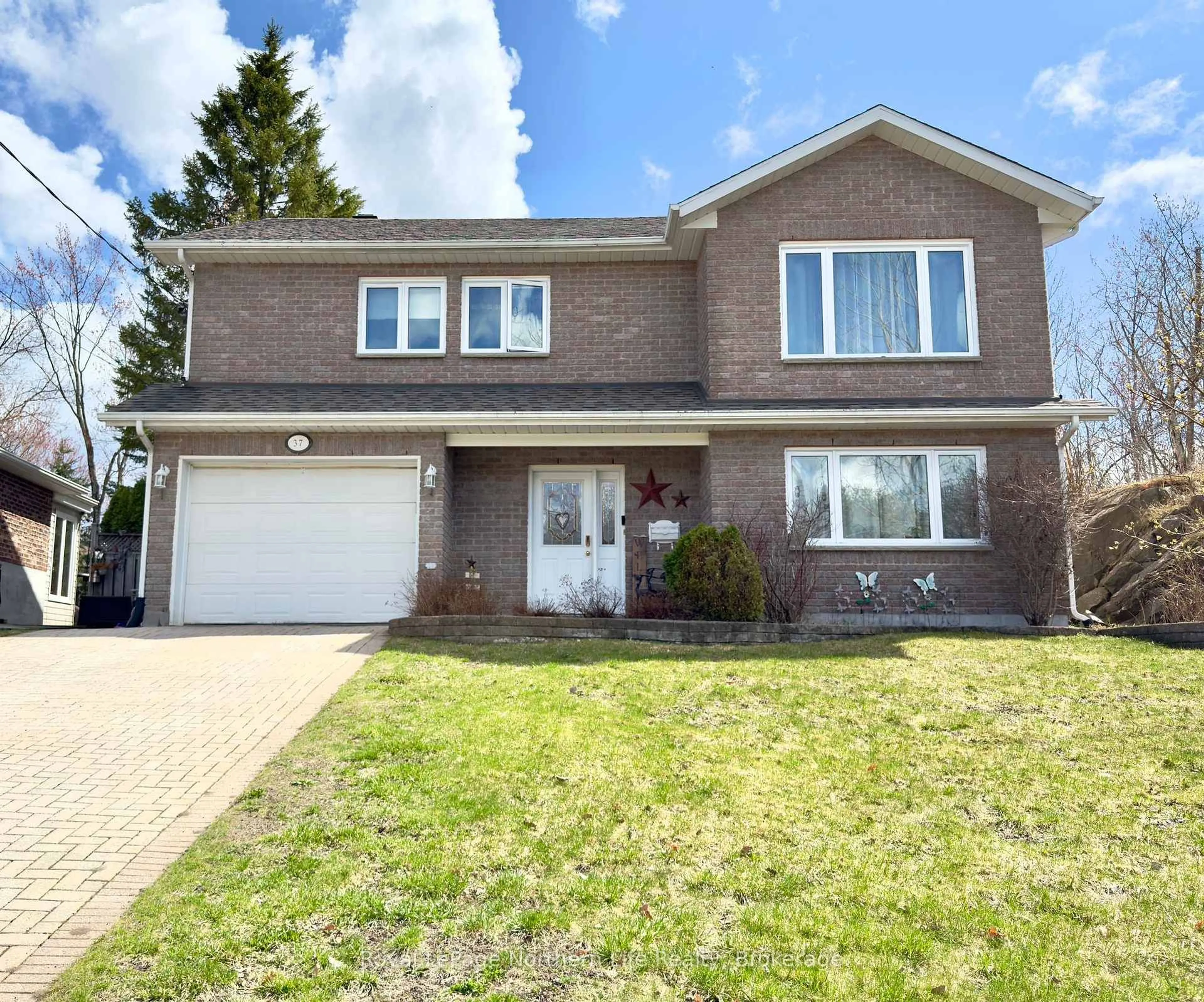 Home with brick exterior material, street for 37 Shallot Cres, North Bay Ontario P1A 3V7