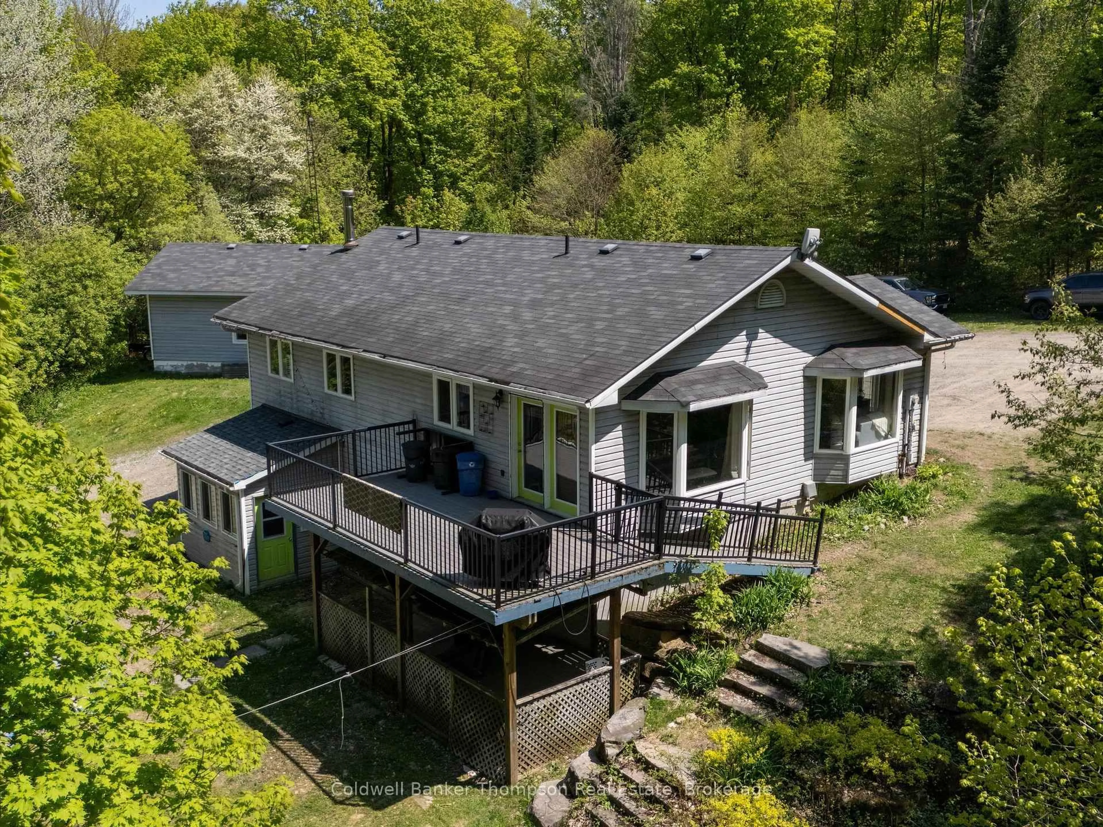 A pic from outside/outdoor area/front of a property/back of a property/a pic from drone, water/lake/river/ocean view for 260 Madill Church Rd, Huntsville Ontario P1H 0G8