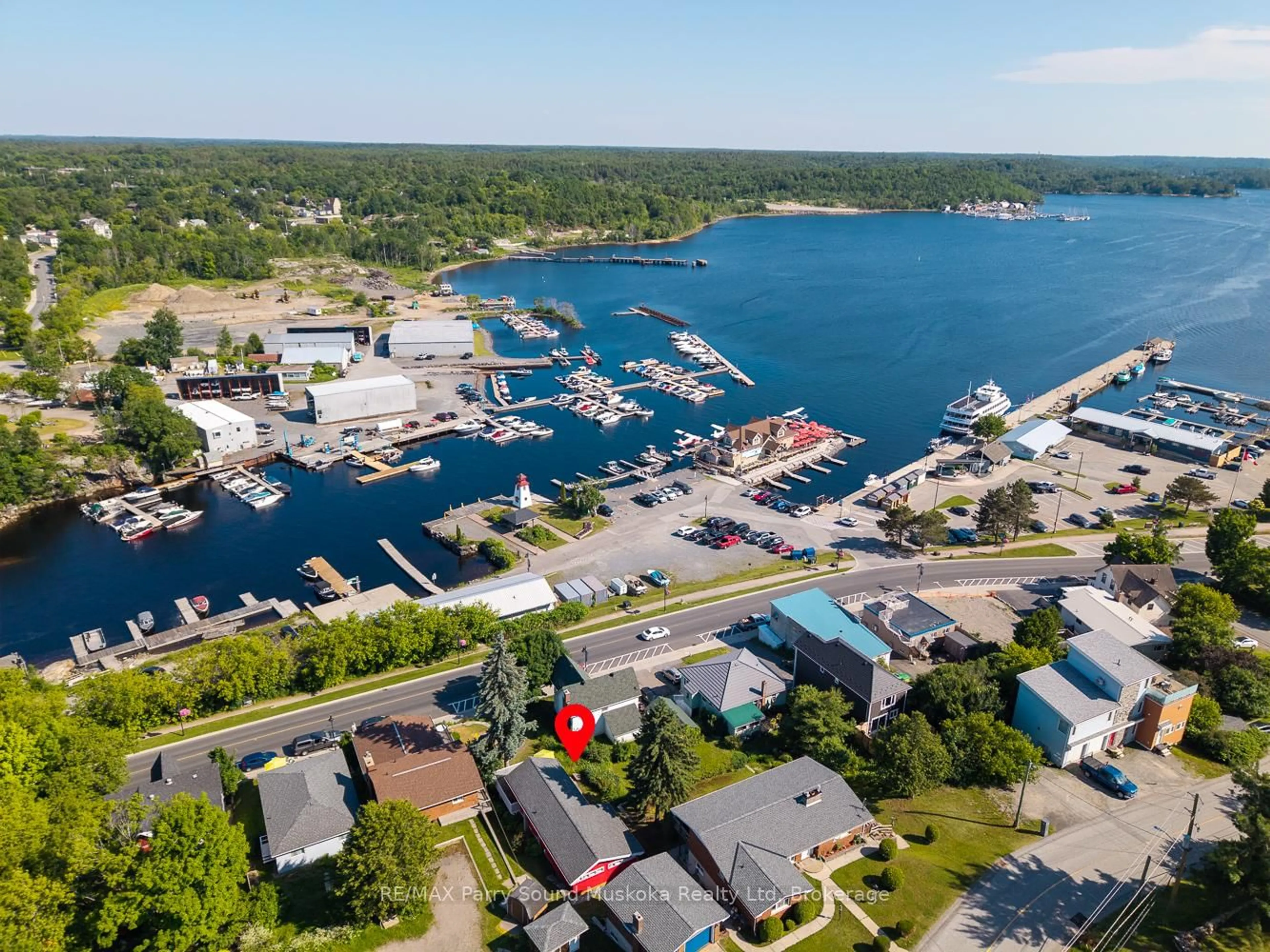 A pic from outside/outdoor area/front of a property/back of a property/a pic from drone, water/lake/river/ocean view for 34 Bay St, Parry Sound Ontario P2A 1S5