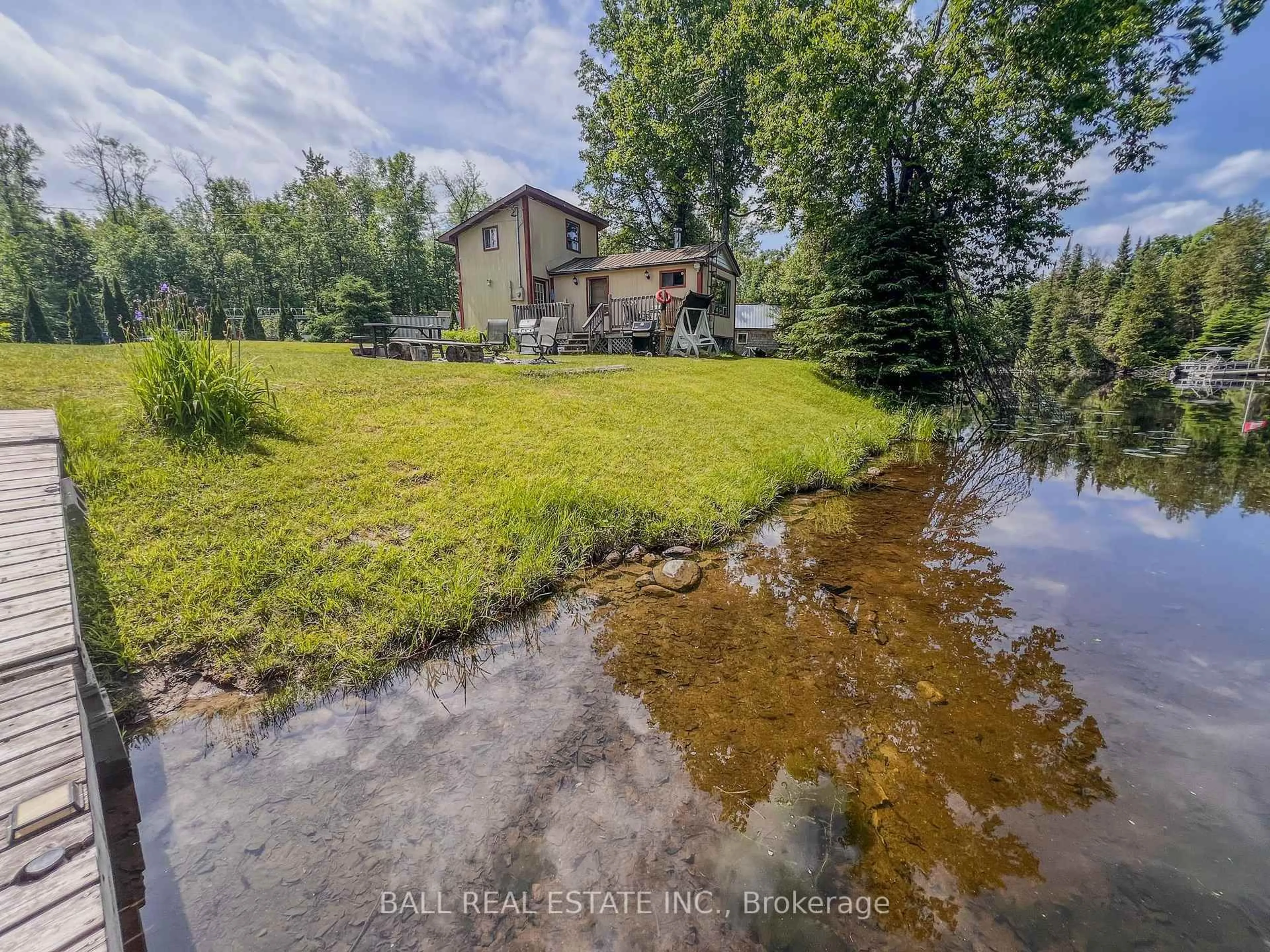 A pic from outside/outdoor area/front of a property/back of a property/a pic from drone, water/lake/river/ocean view for 106 Fidlar Crt, Limoges Ontario K0K 2M0