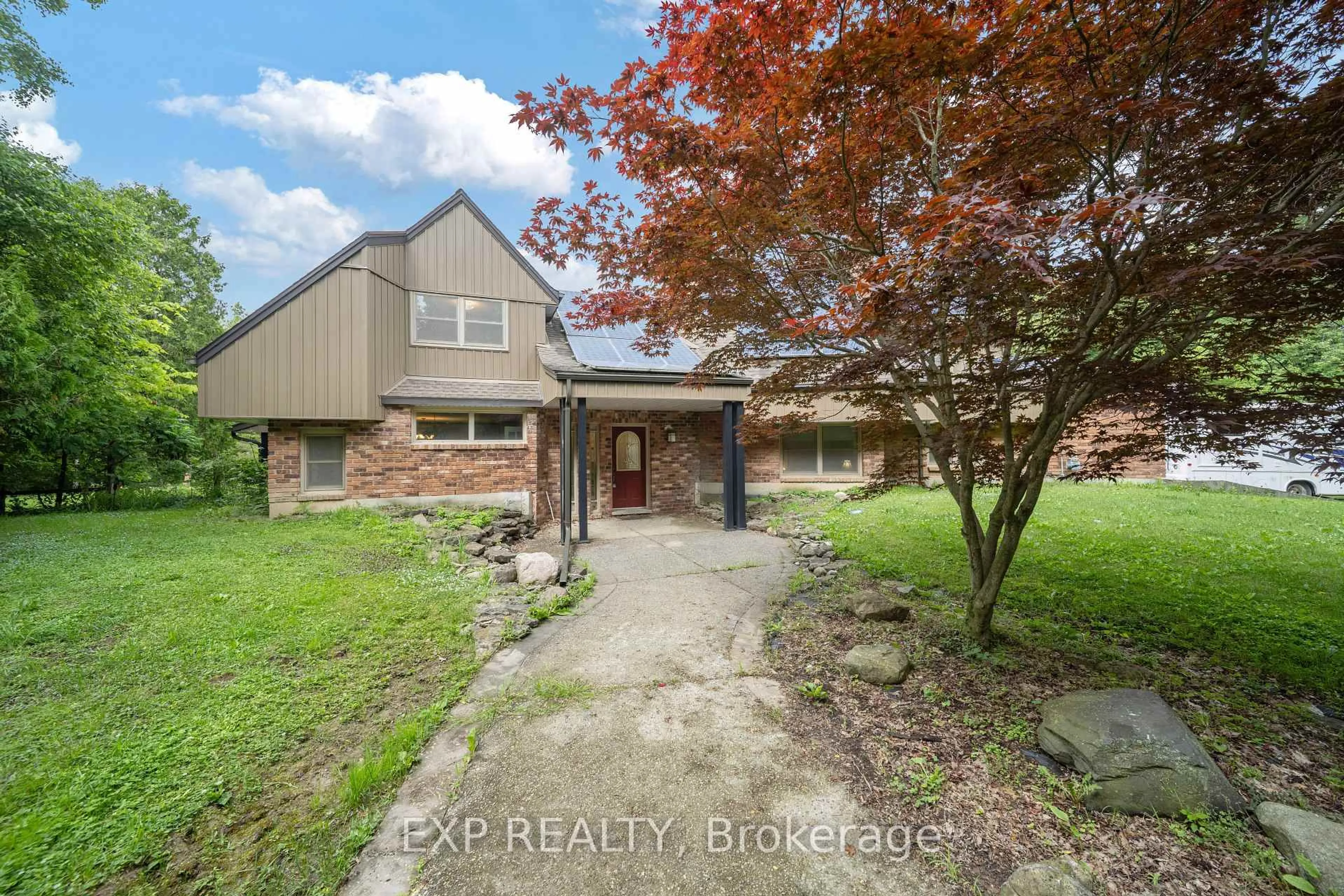 A pic from outside/outdoor area/front of a property/back of a property/a pic from drone, unknown for 30622 Hungry Hollow Rd, Lambton Shores Ontario N0M 1B0