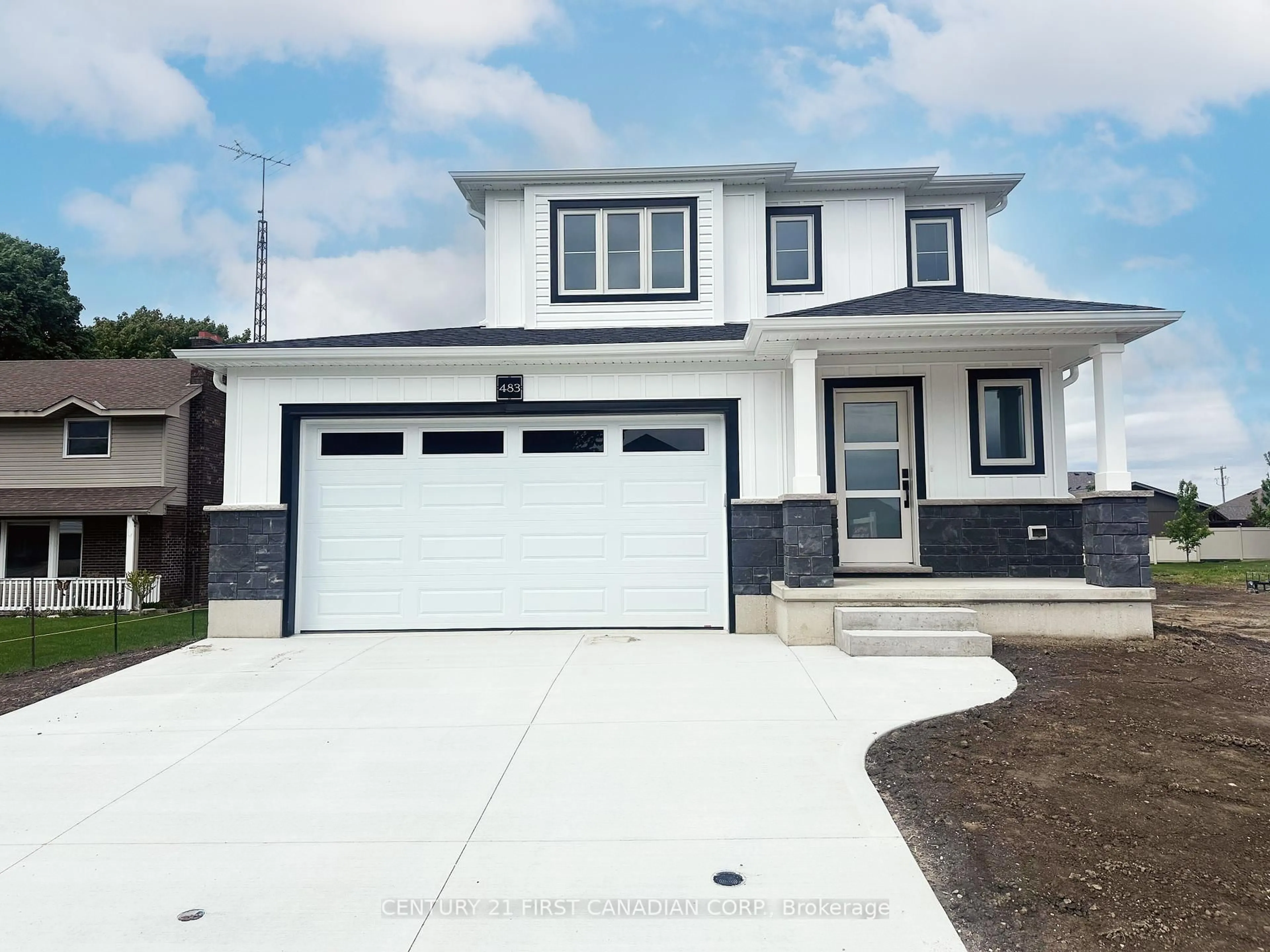 Home with vinyl exterior material, street for 483 Huron St, Plympton-Wyoming Ontario N0N 1T0