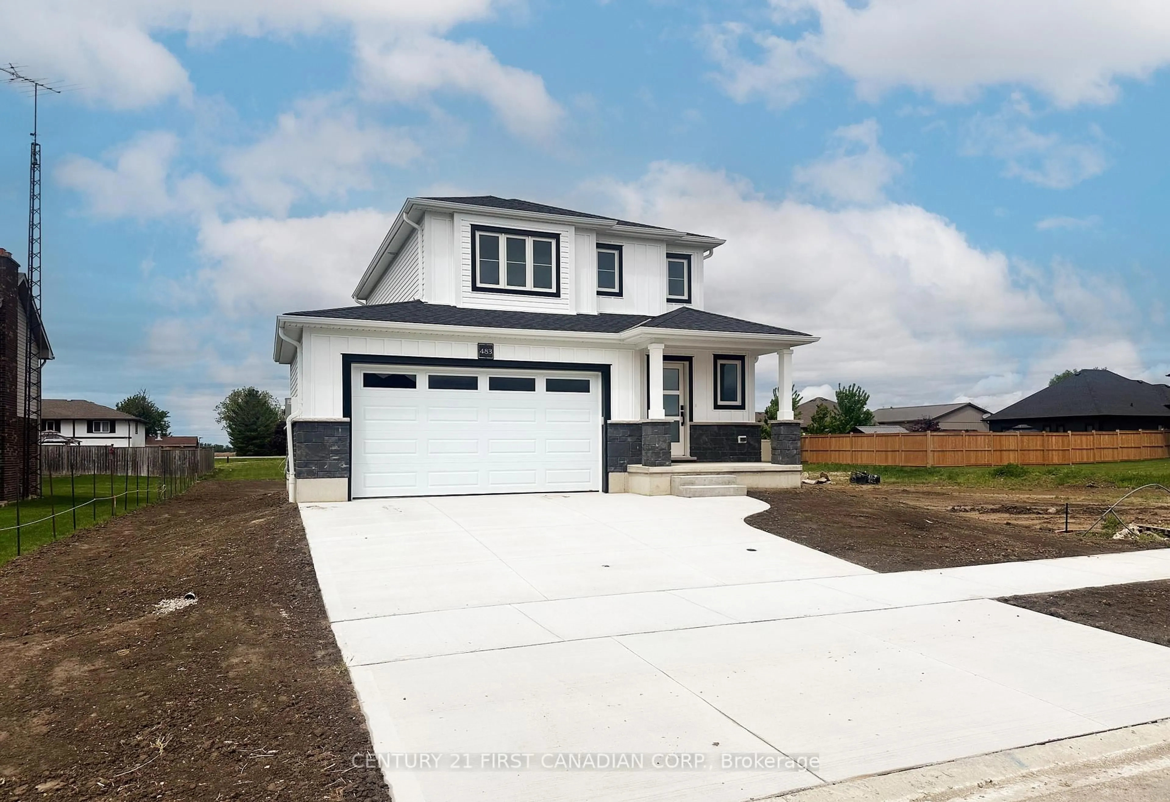 Home with vinyl exterior material, street for 483 Huron St, Plympton-Wyoming Ontario N0N 1T0
