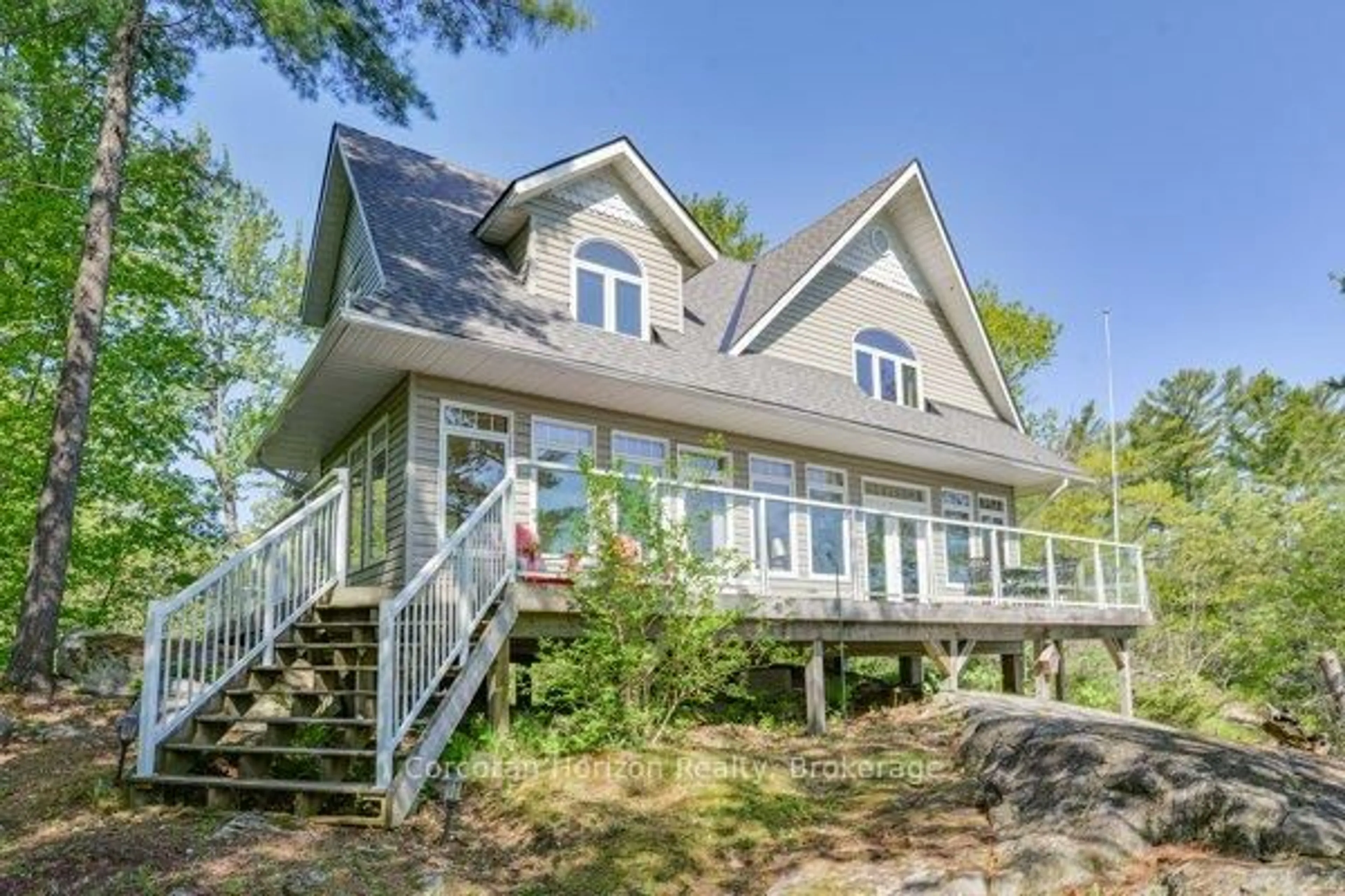Home with vinyl exterior material, water/lake/river/ocean view for 1320 Island 360 Island, Georgian Bay Ontario L0K 1S0